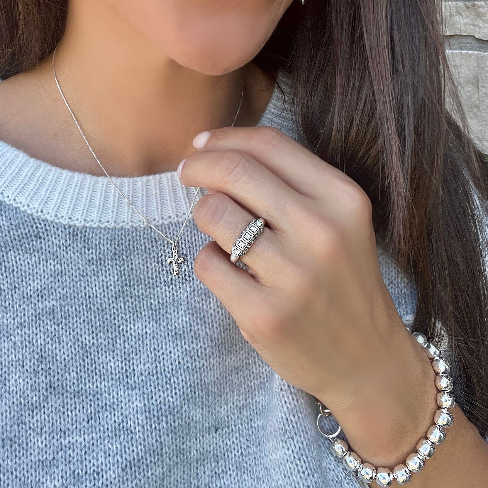 Heirloom ring paired with the vine necklace and Influencer Bracelet