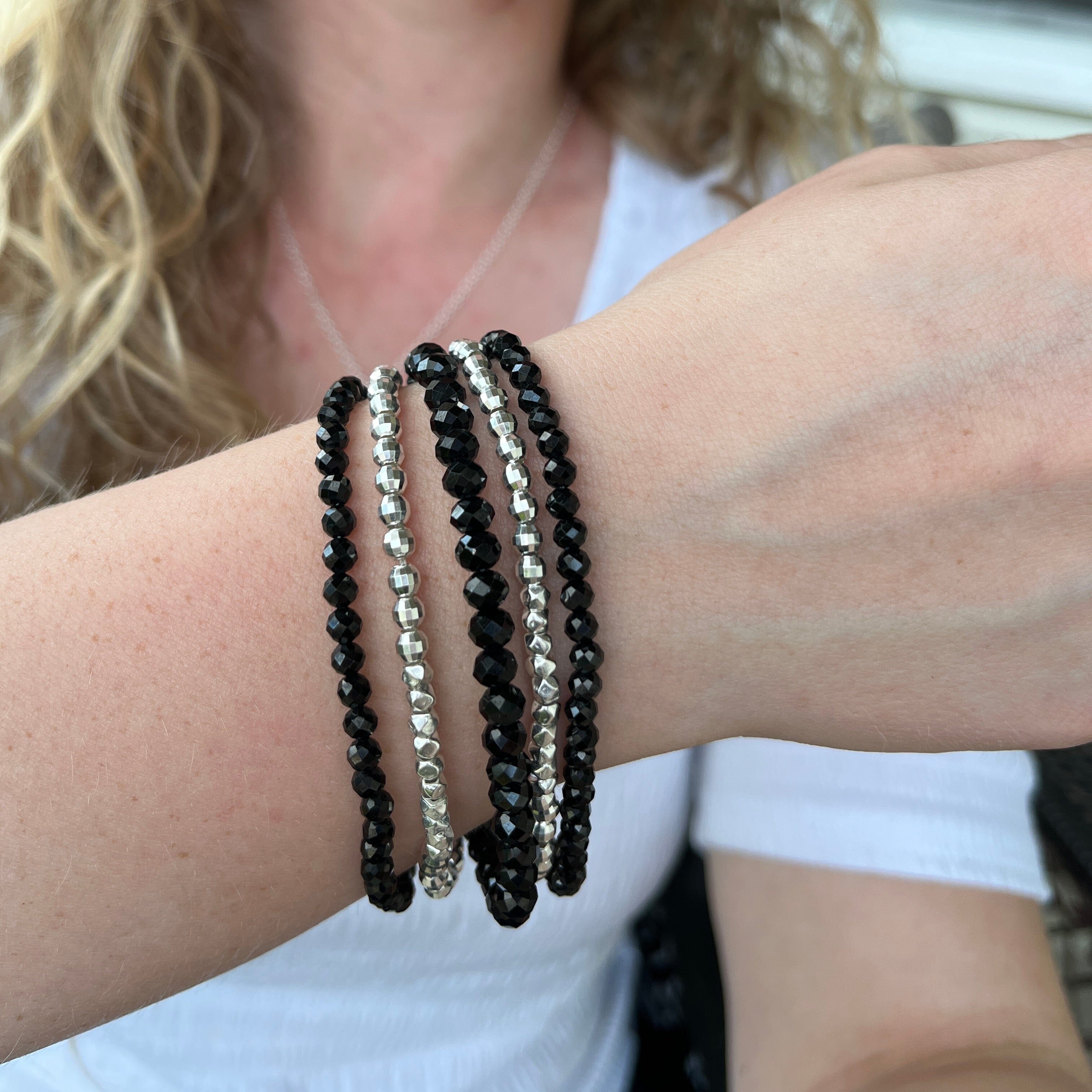 five strand bracelet with onyx beads and sterling silver lobster clasp