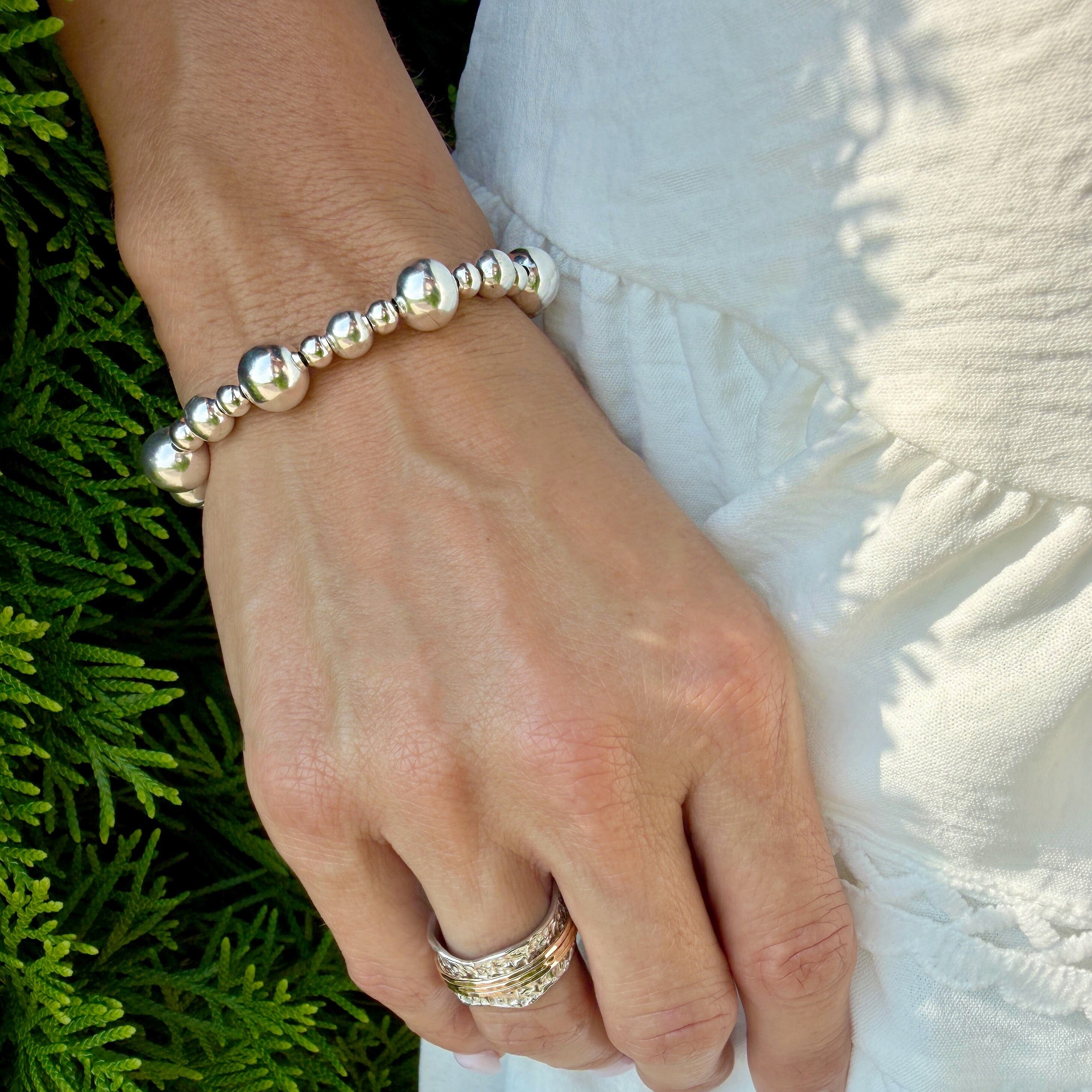 bracelet with various sized silver beads