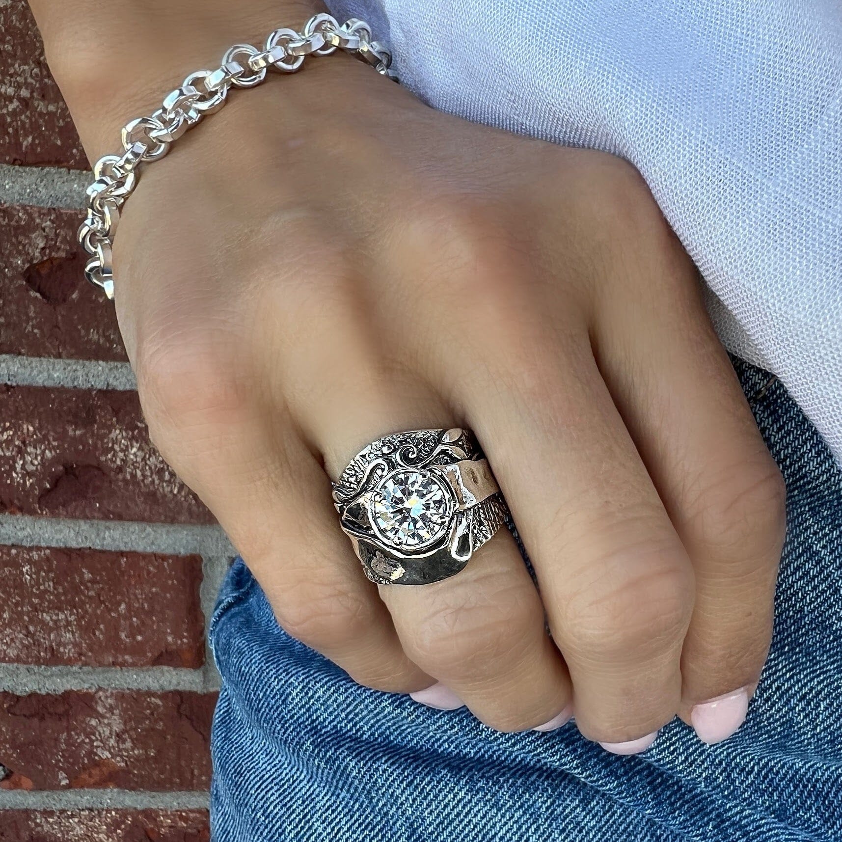 detailed sterling silver ring, hoopla ring. paired with a linked bracelet, bonita