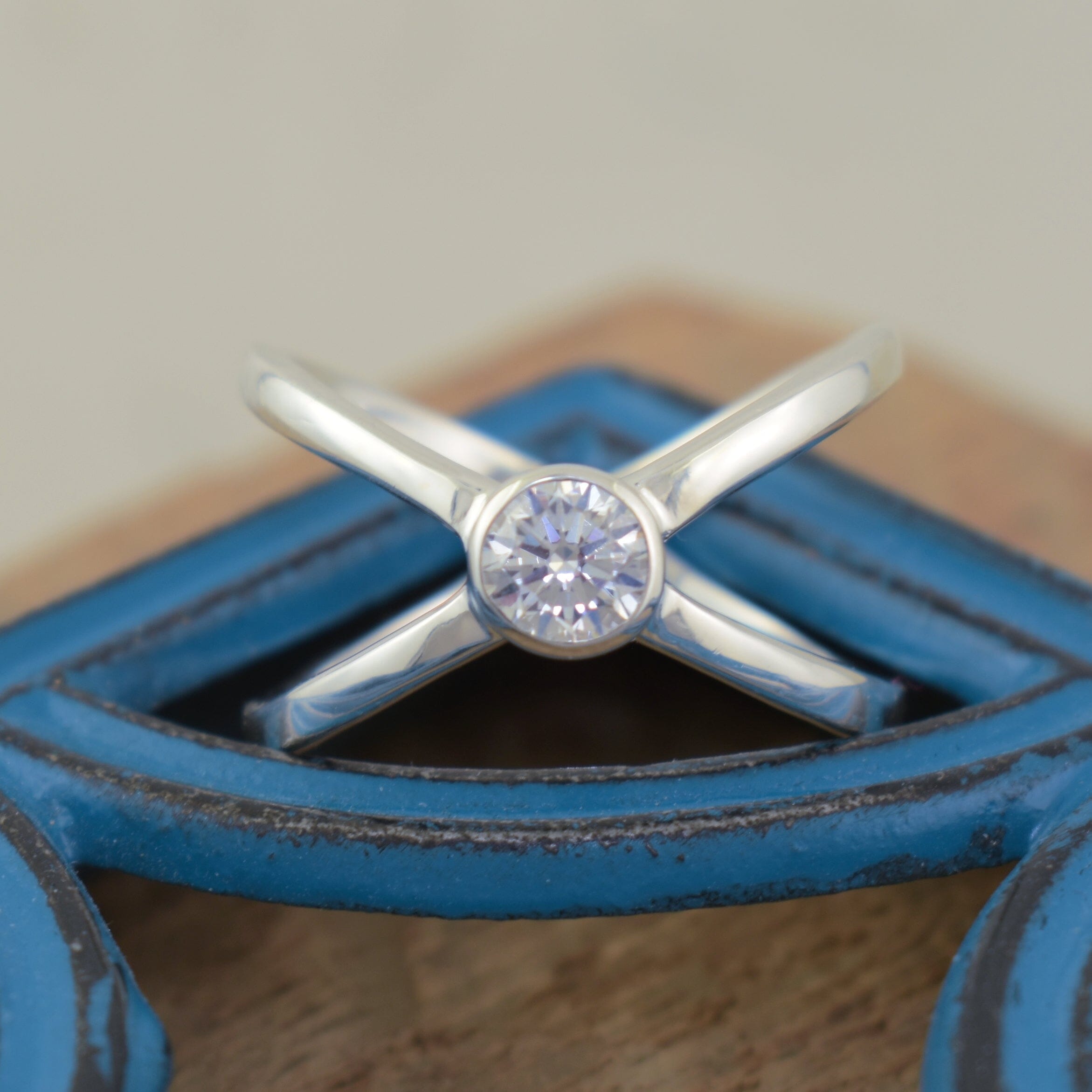 sterling silver Intersect Ring featuring a cubic zirconia center