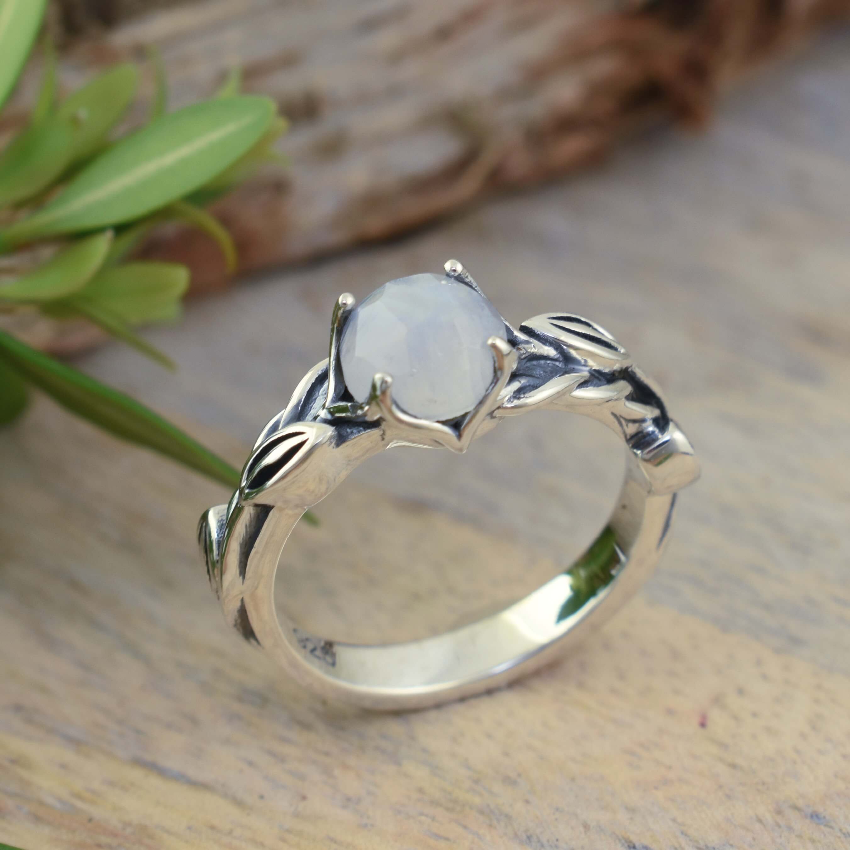 Vine-inspired ring with round rainbow moonstone