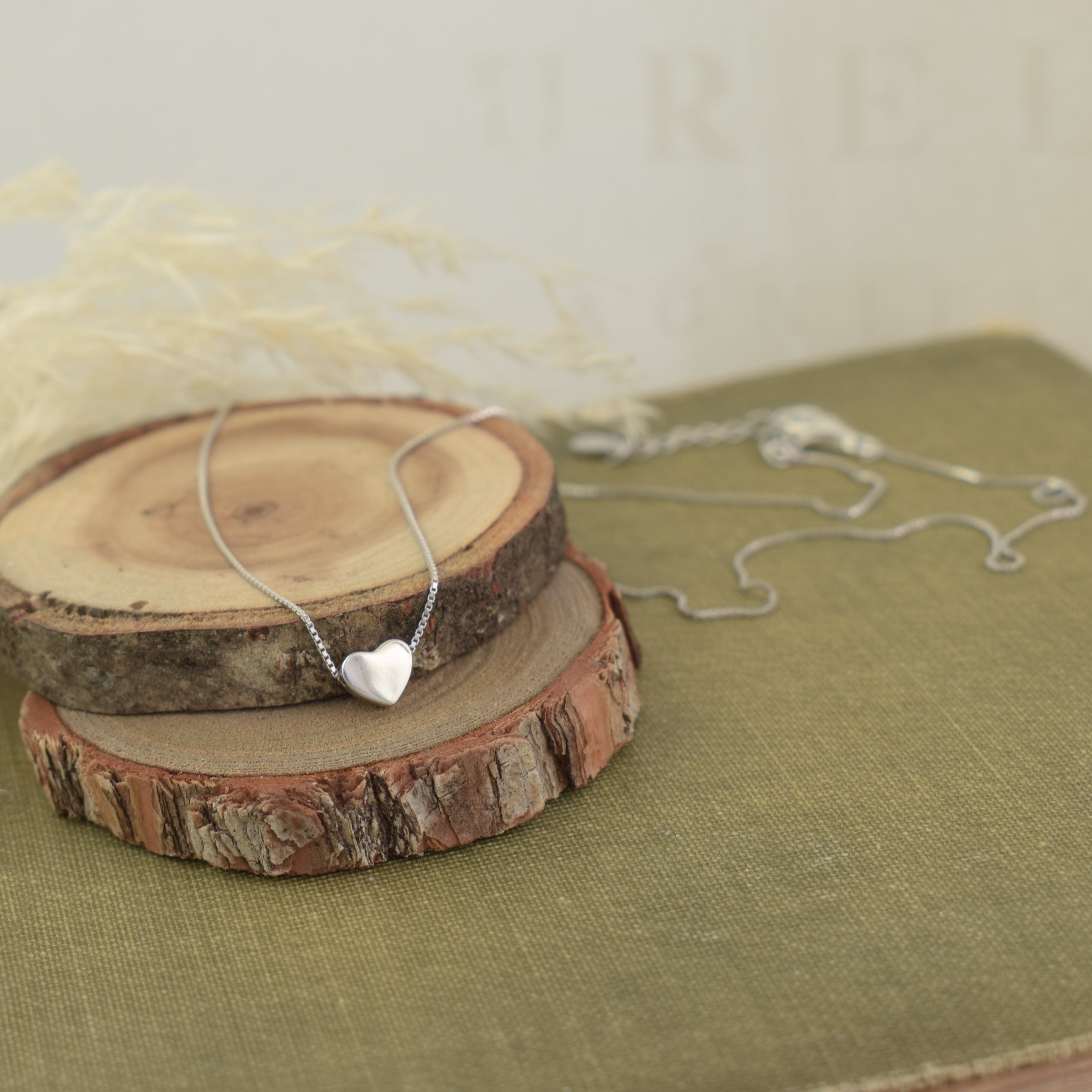 delicate tiny heart necklace in oxidized sterling silver