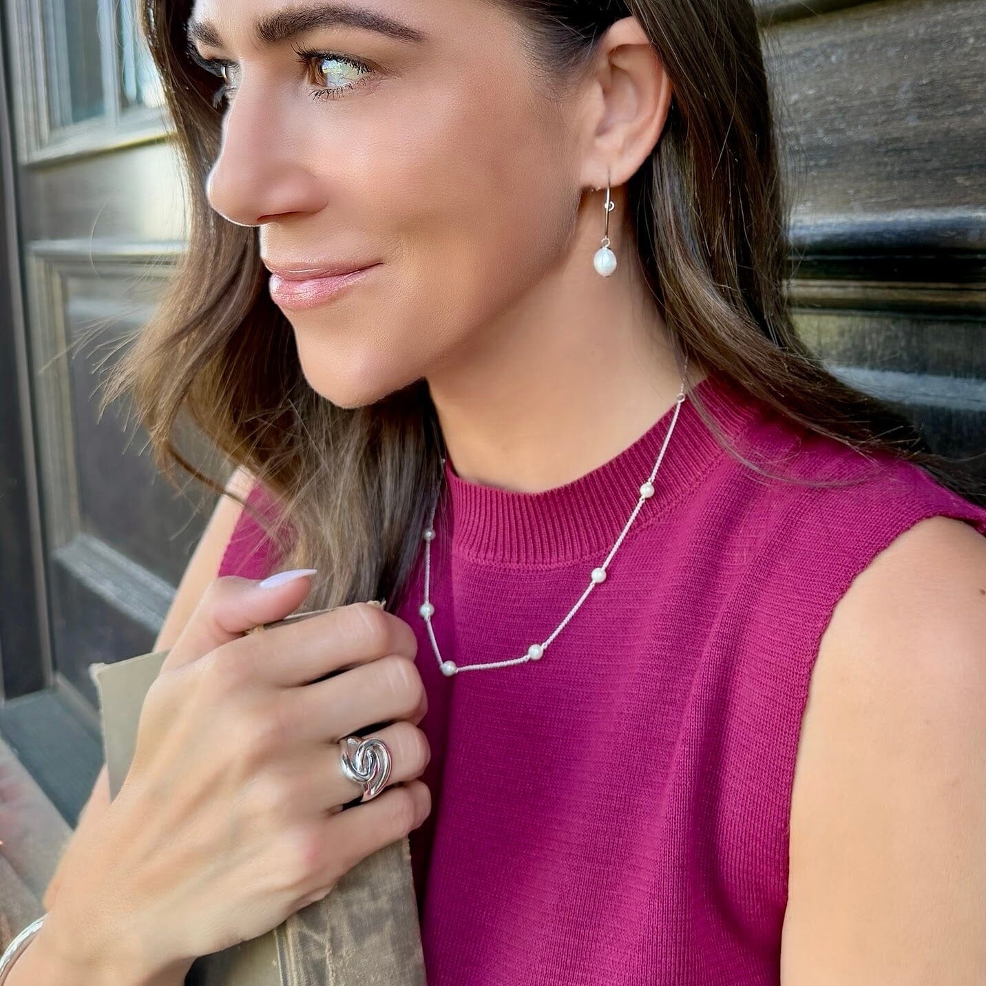 Ivory Tide Earrings paired with sterling silver jewelry