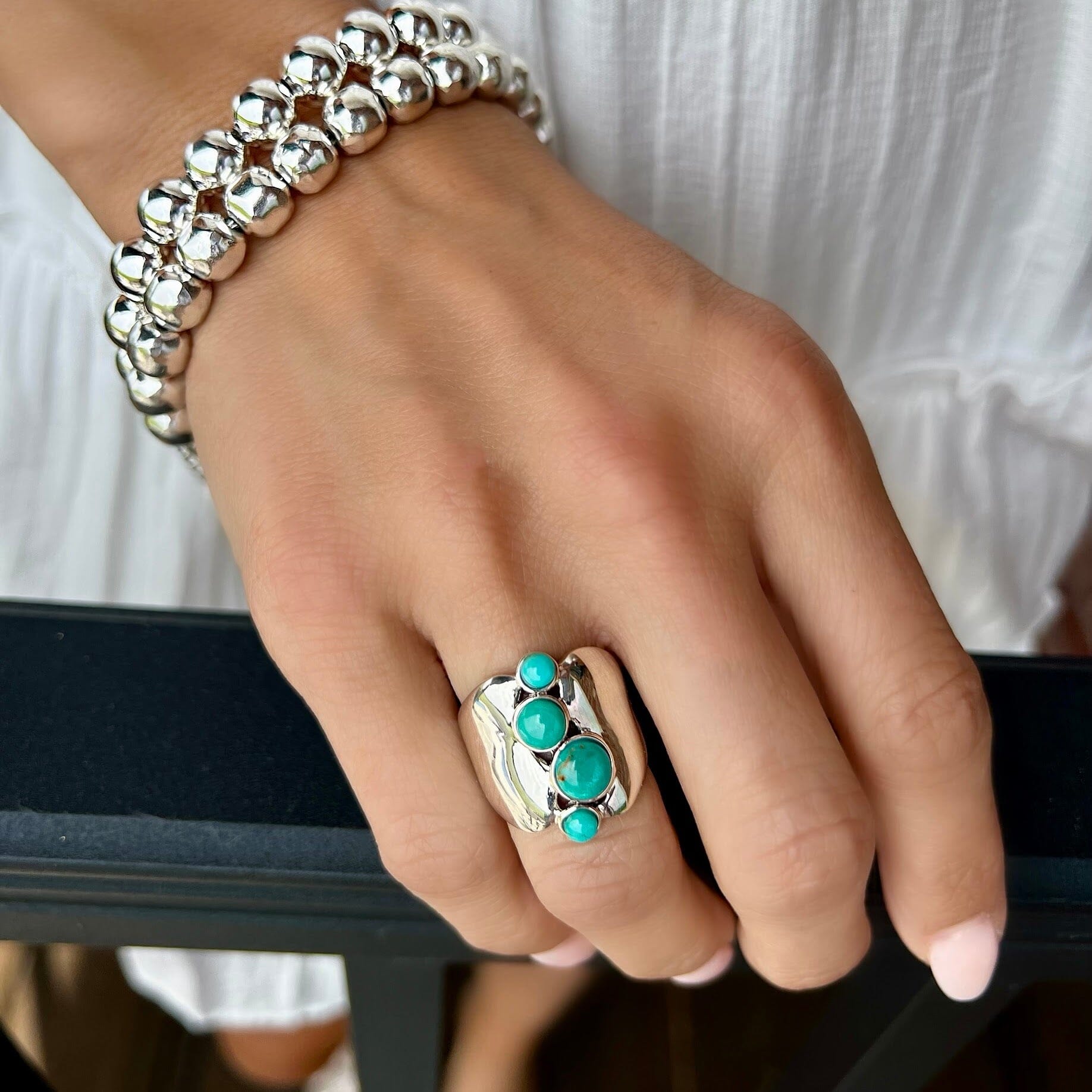 sterling silver handcrafted sterling silver with four turquoise stones