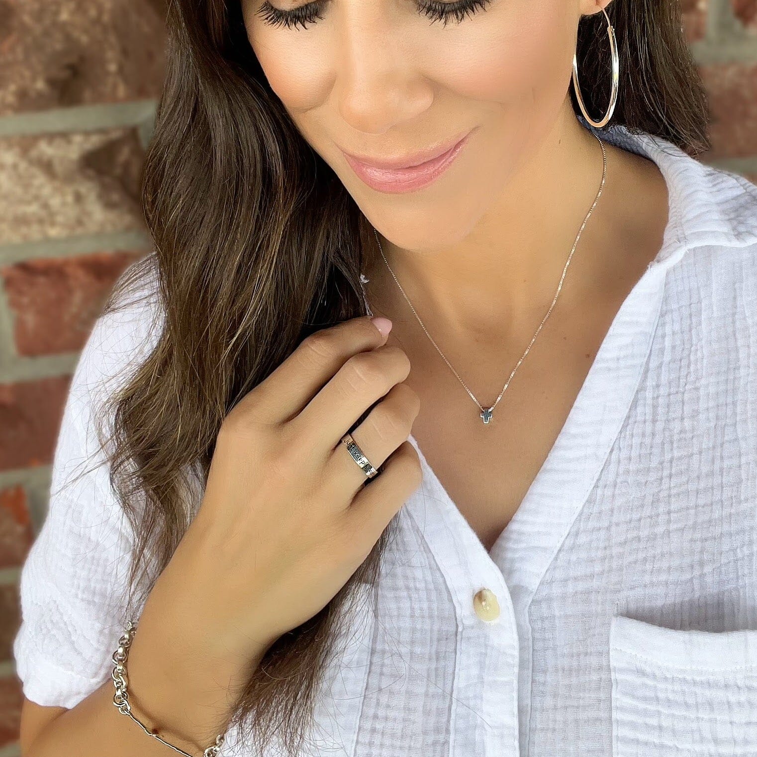 Just Keep Swimming Ring paired with Simply the Best Hoops, Itty Bitty Cross Necklace, and Cherished One Bracelet