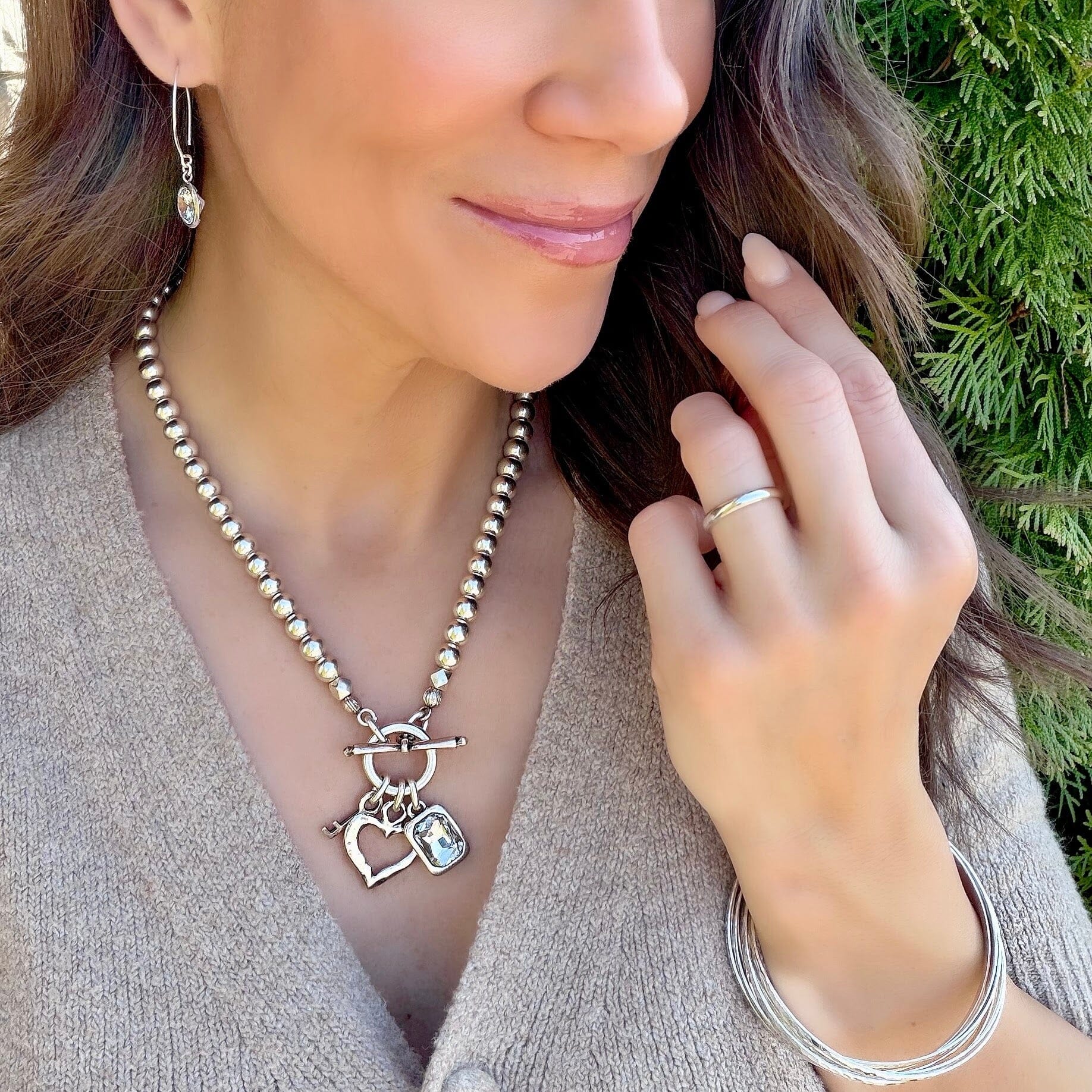 Key To My Sass Necklace paired with sterling silver jewelry