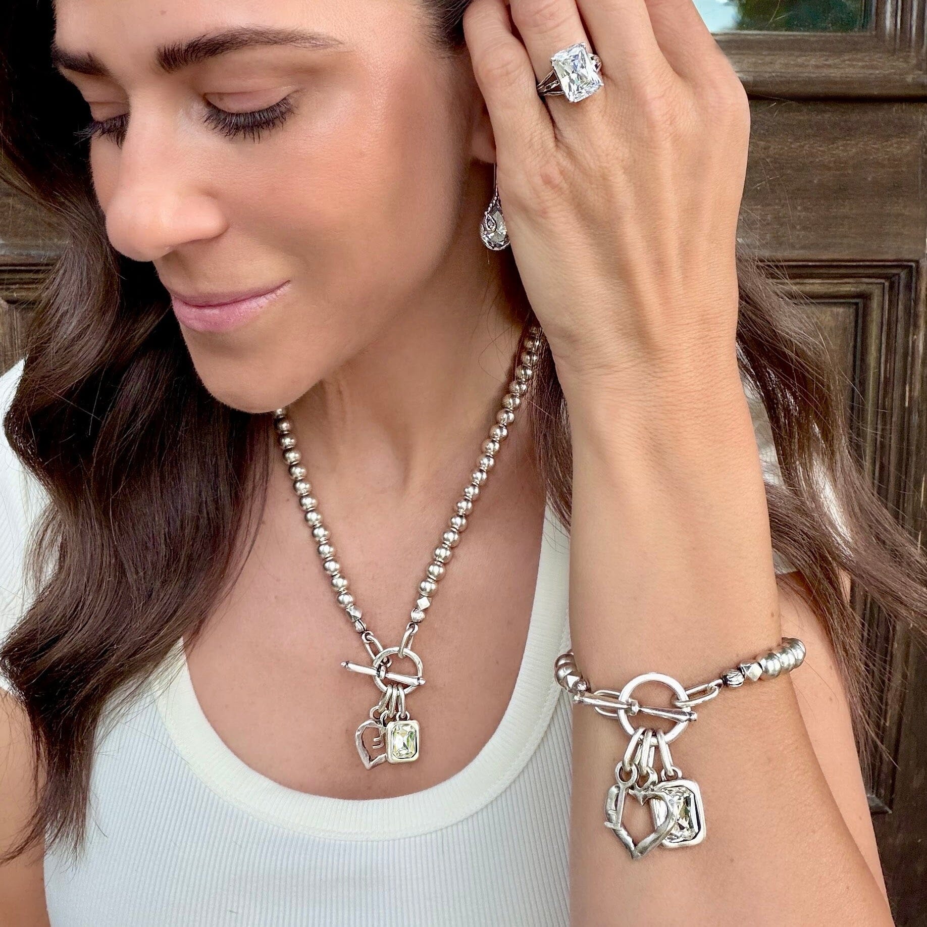 matching Key to my Saass necklace and bracelet featuring a clear stone