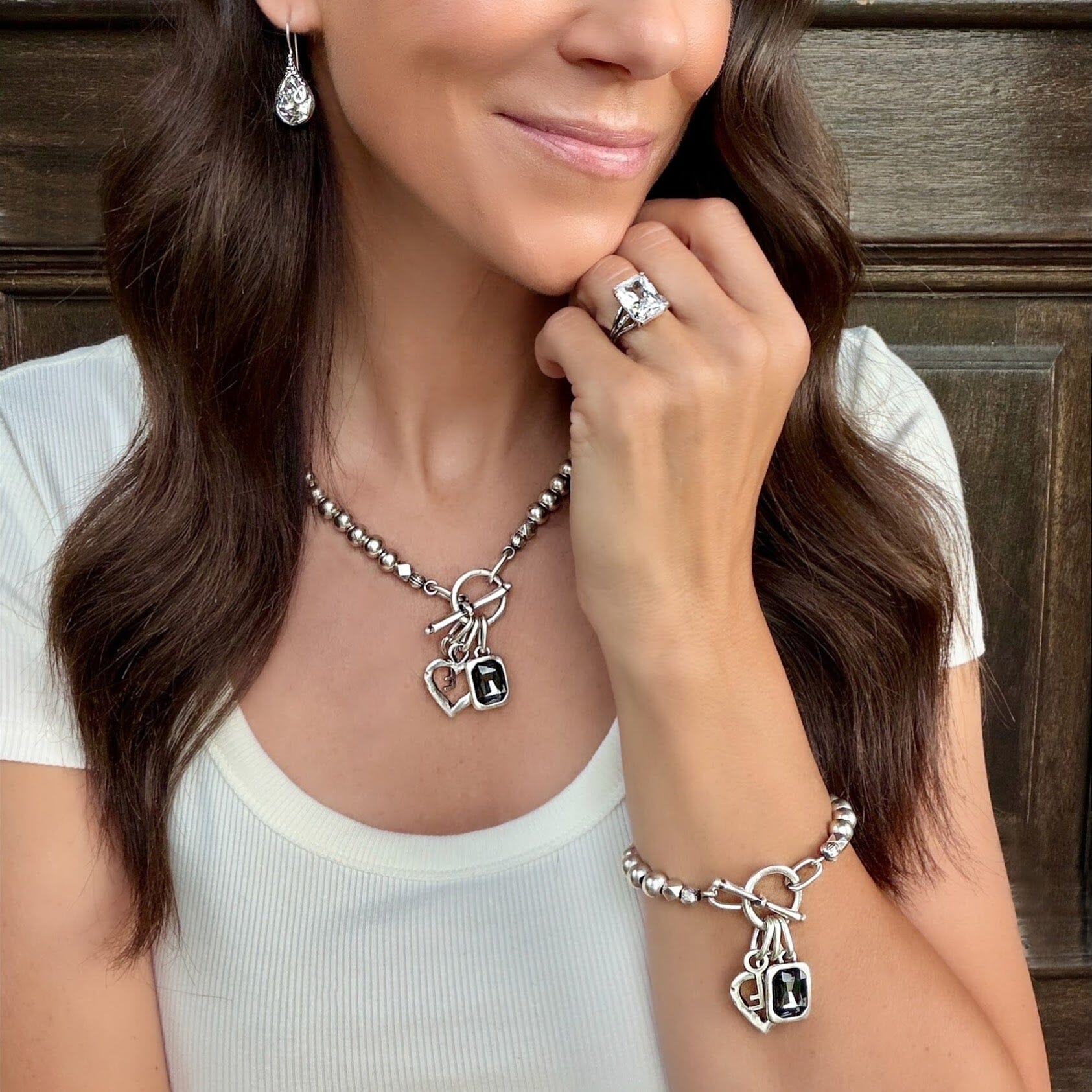 matching Key to my Saass necklace and bracelet featuring a gray stone