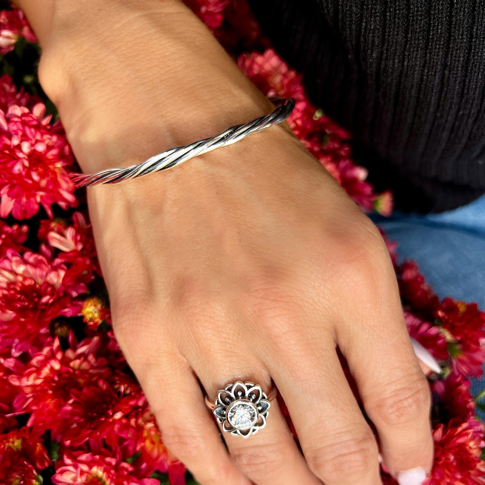 oxidized sterling silver bangle with a twist design
