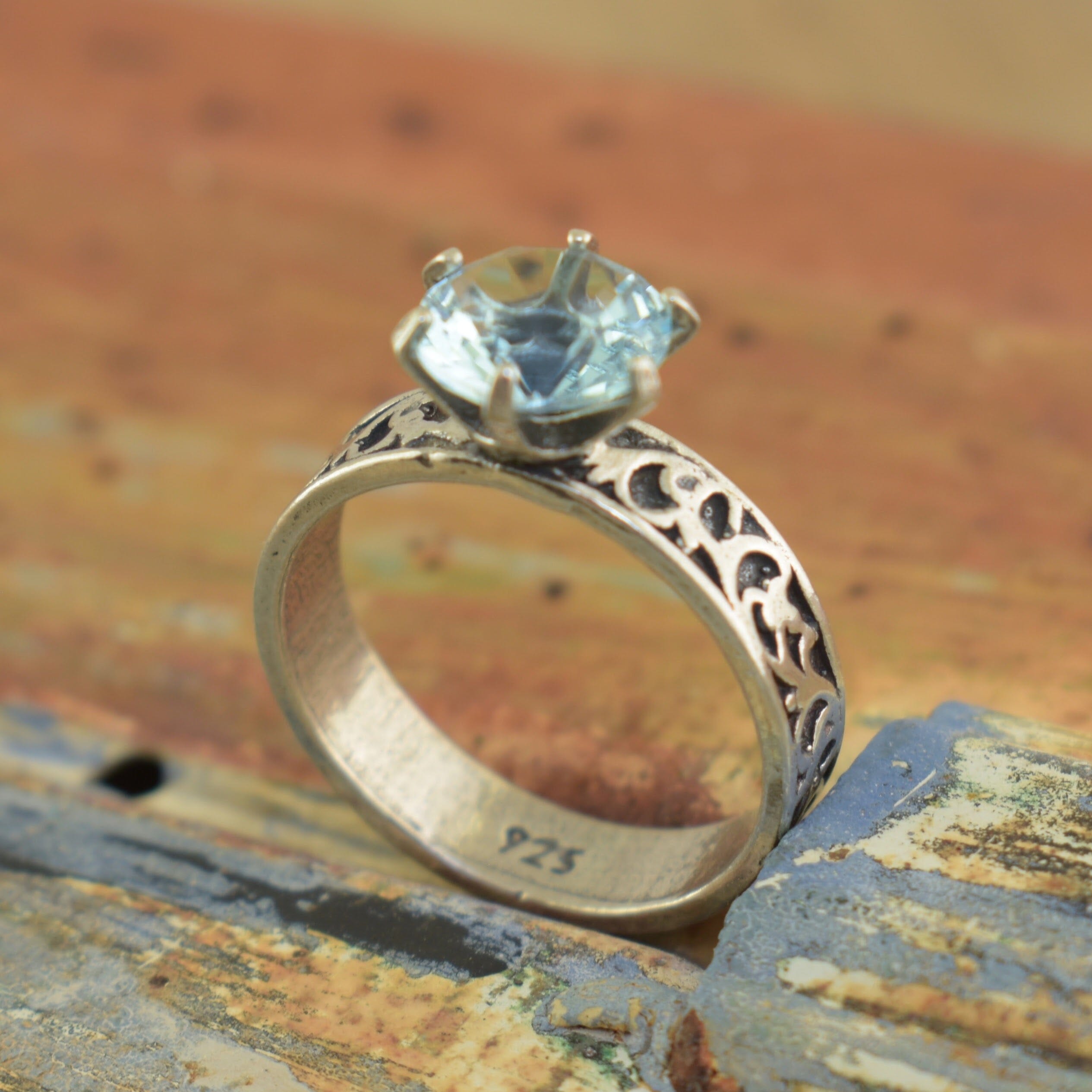 Synthetic Aquamarine stone with a detailed band