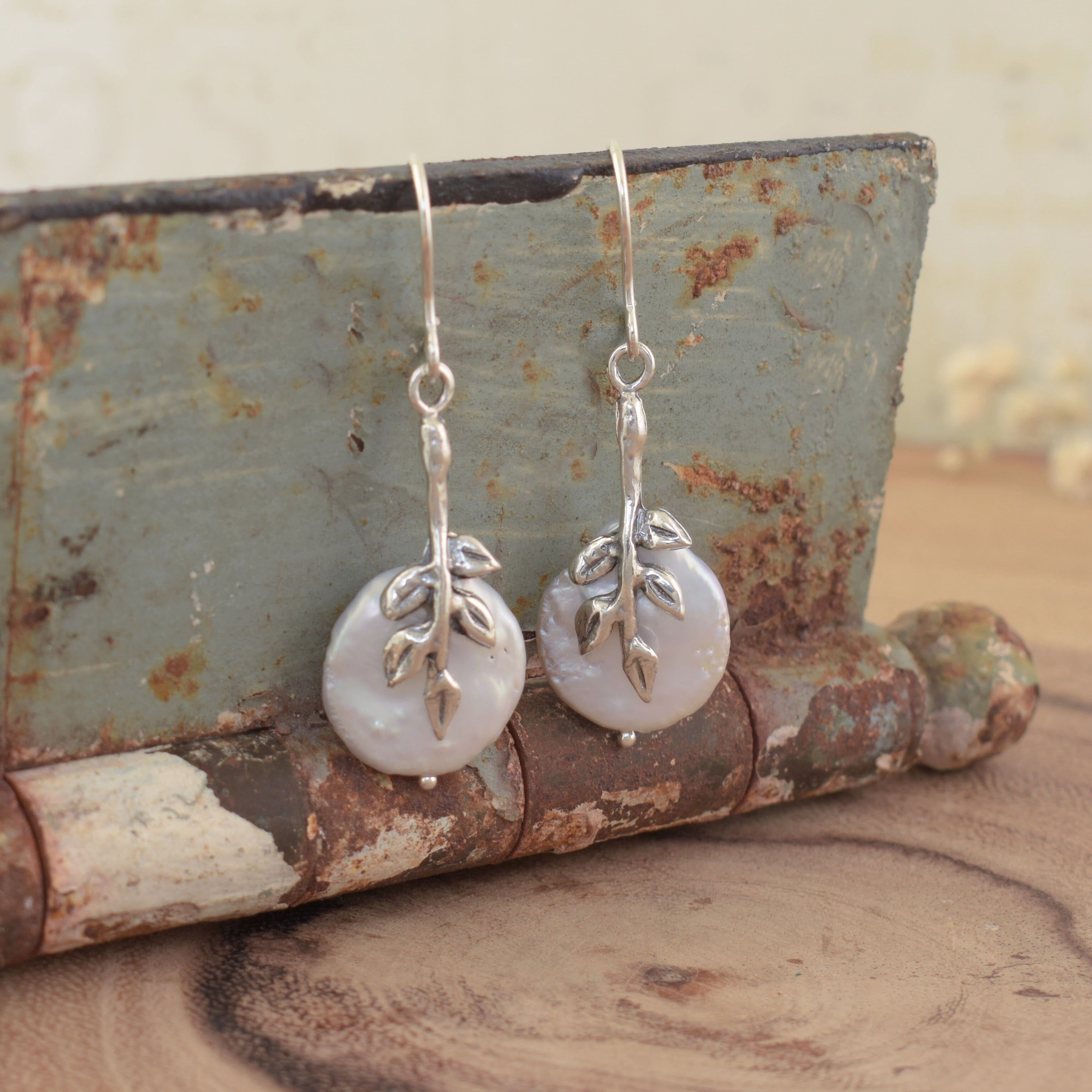 Freshwater pearl earrings with sterling silver vines down the front