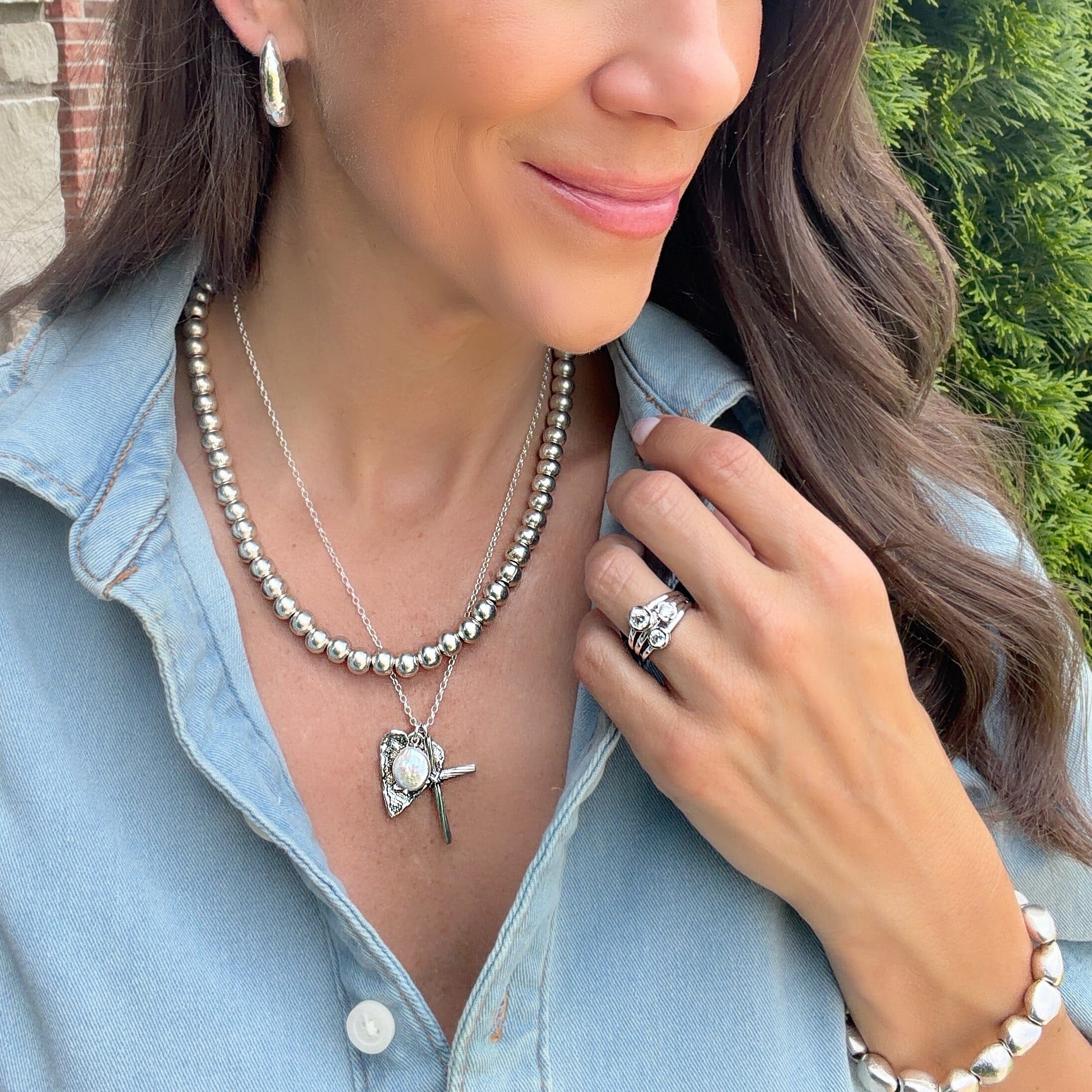 statement beaded necklace with a silver plated zamak finish
