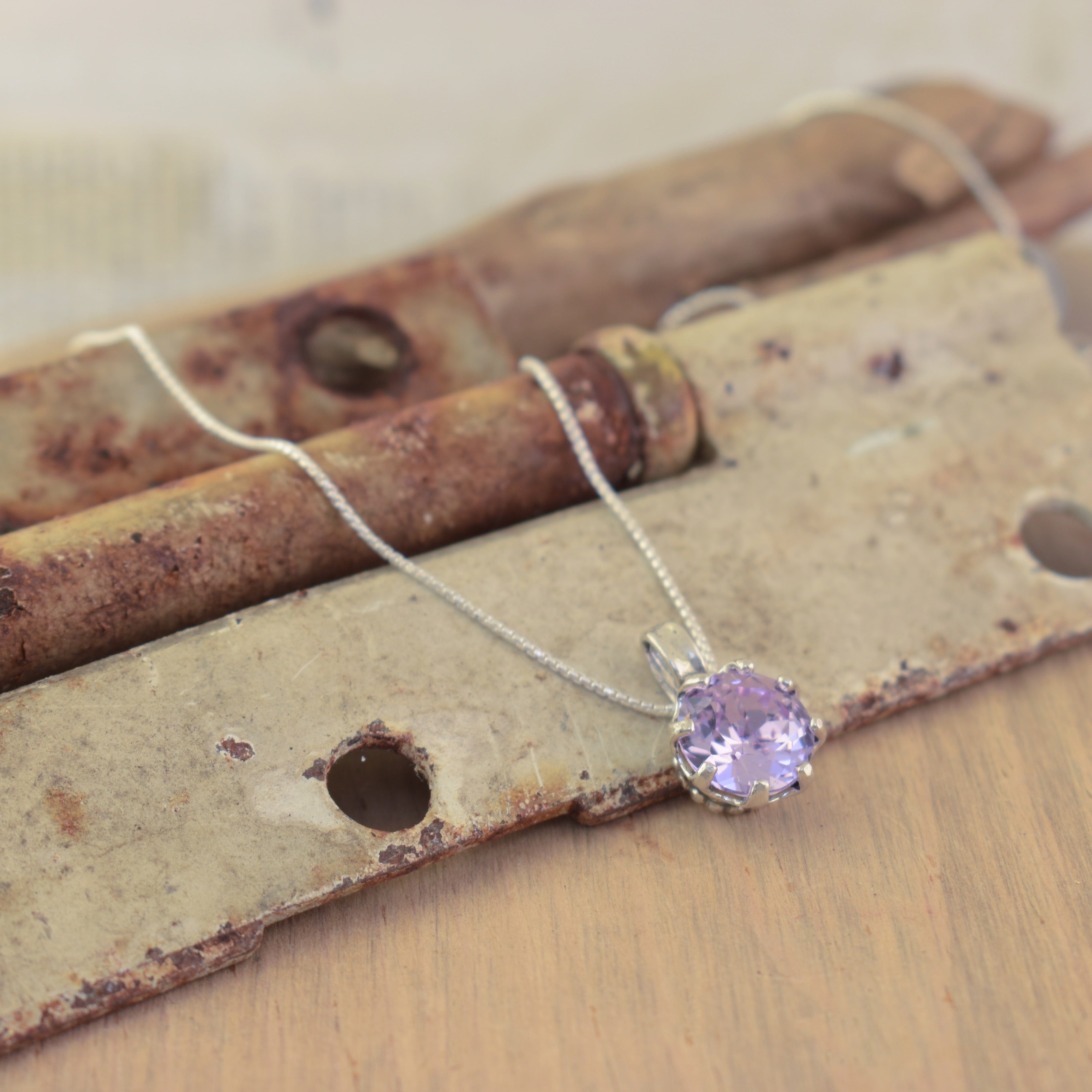 sterling silver necklace with purple stone