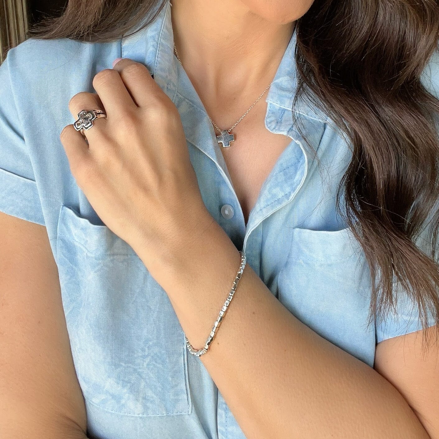 Line of Distinction Bracelet paired with silver Christian jewelry
