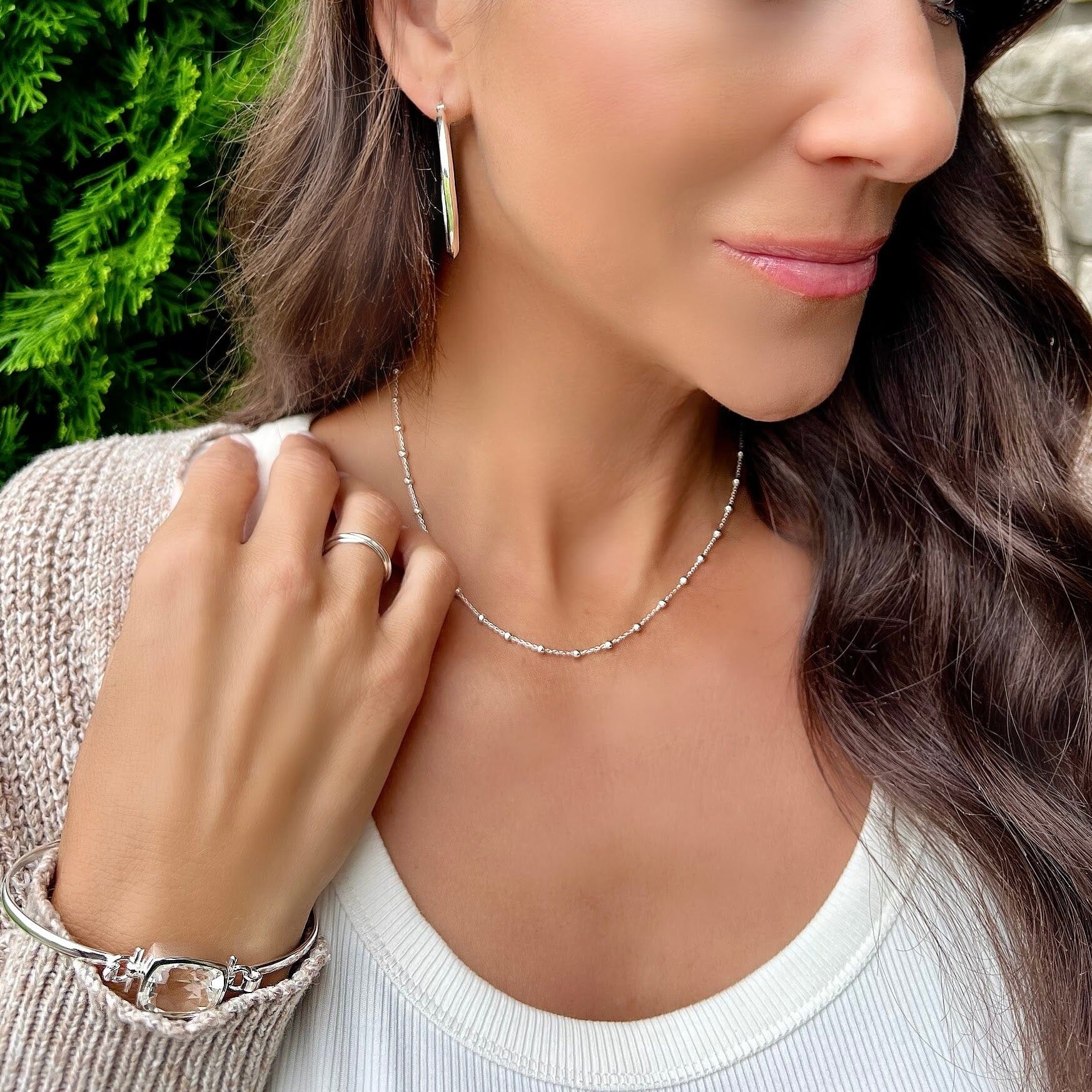 Lit'l Bead Station Choker paired with the overtly oval earrings, trio ring and  the success story bracelet