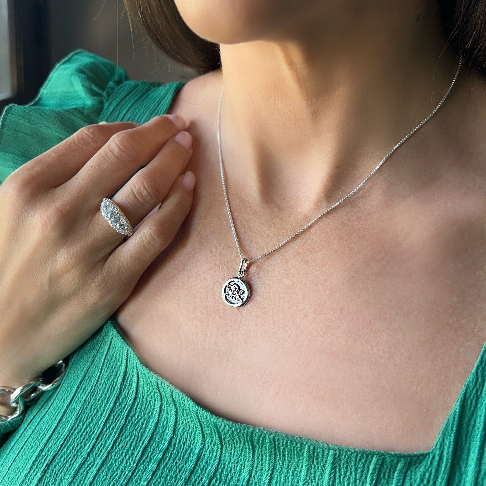 dainty angel pendant in sterling silver