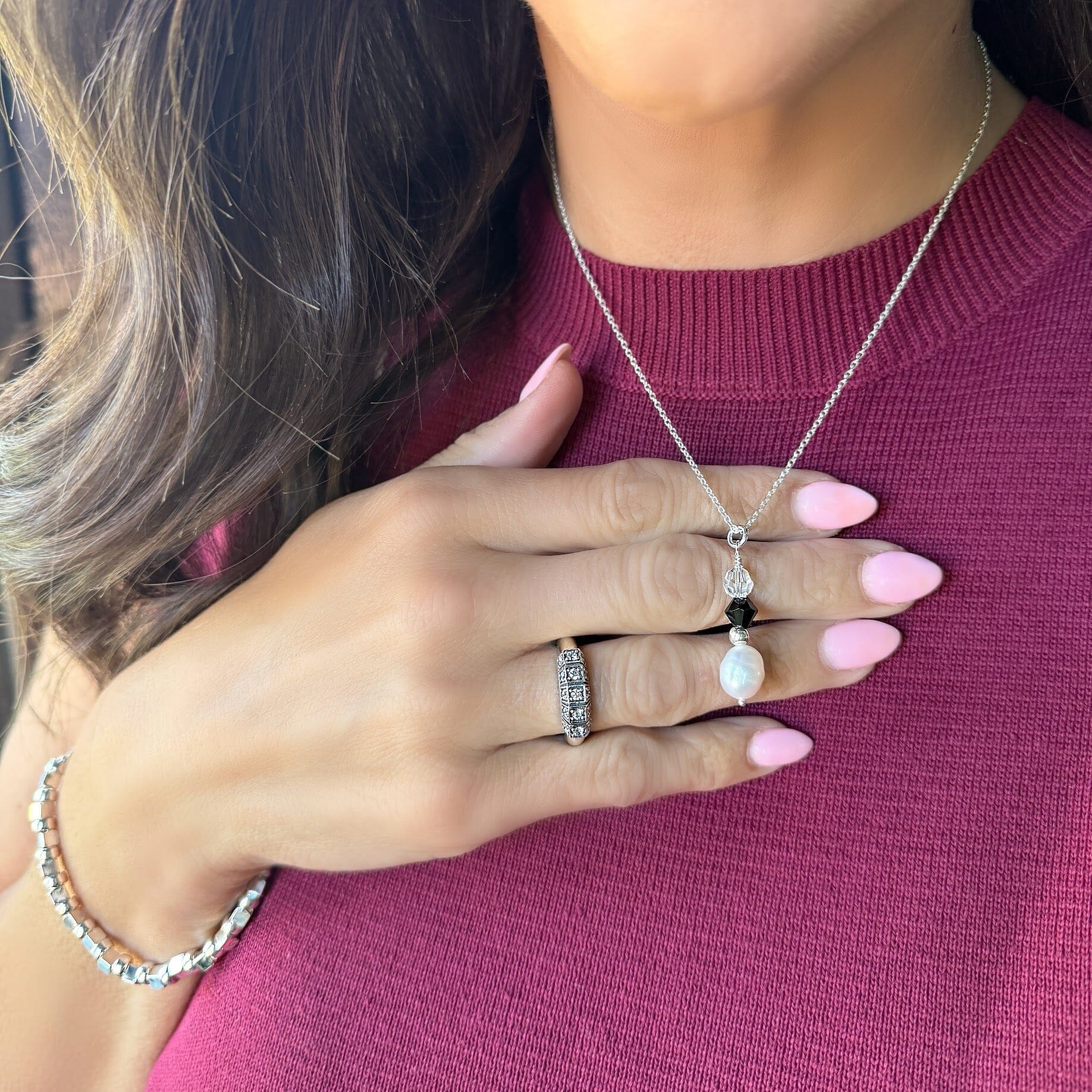 Sterling silver chain with a drop pendant