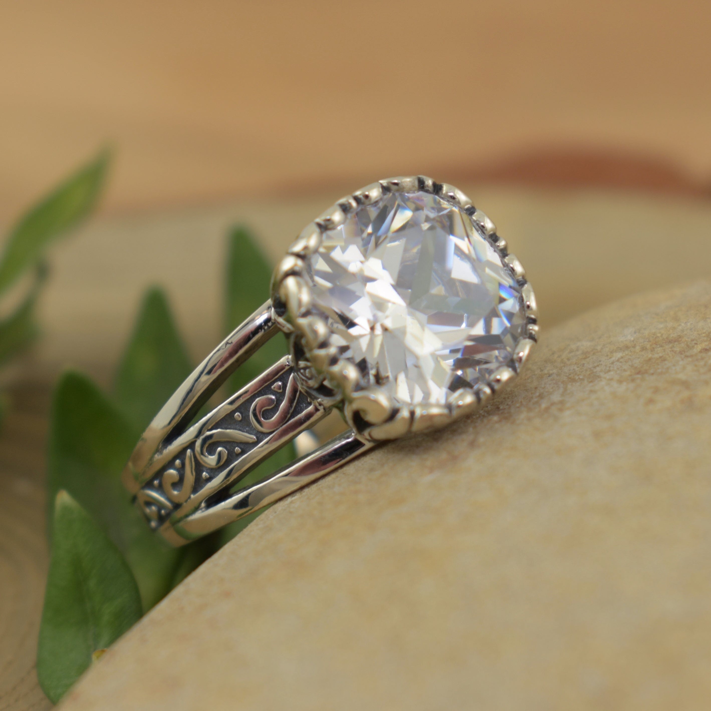 triple band sterling silver ring that comes together with a cz center