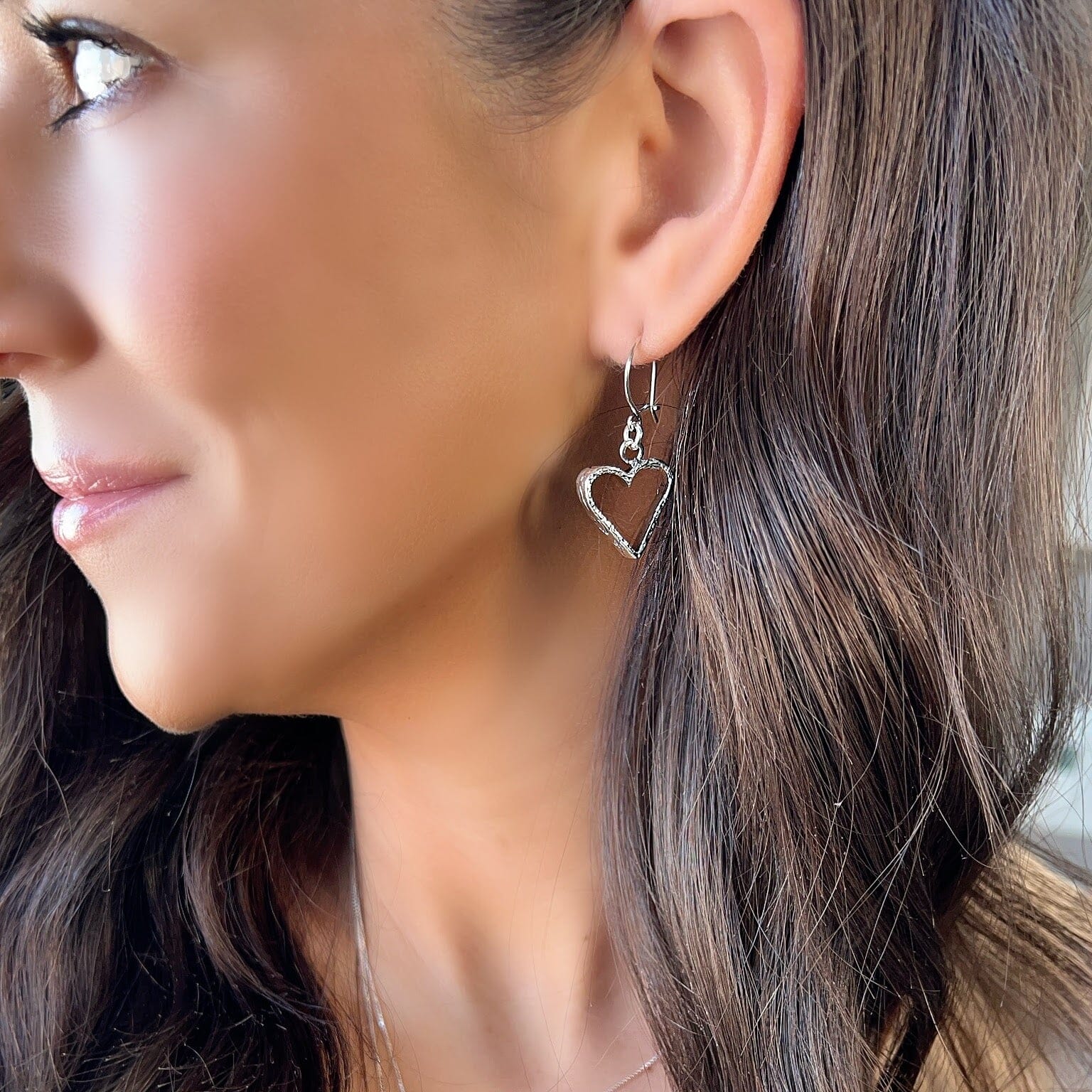 sterling silver cutout heart earring with engravings on the sides