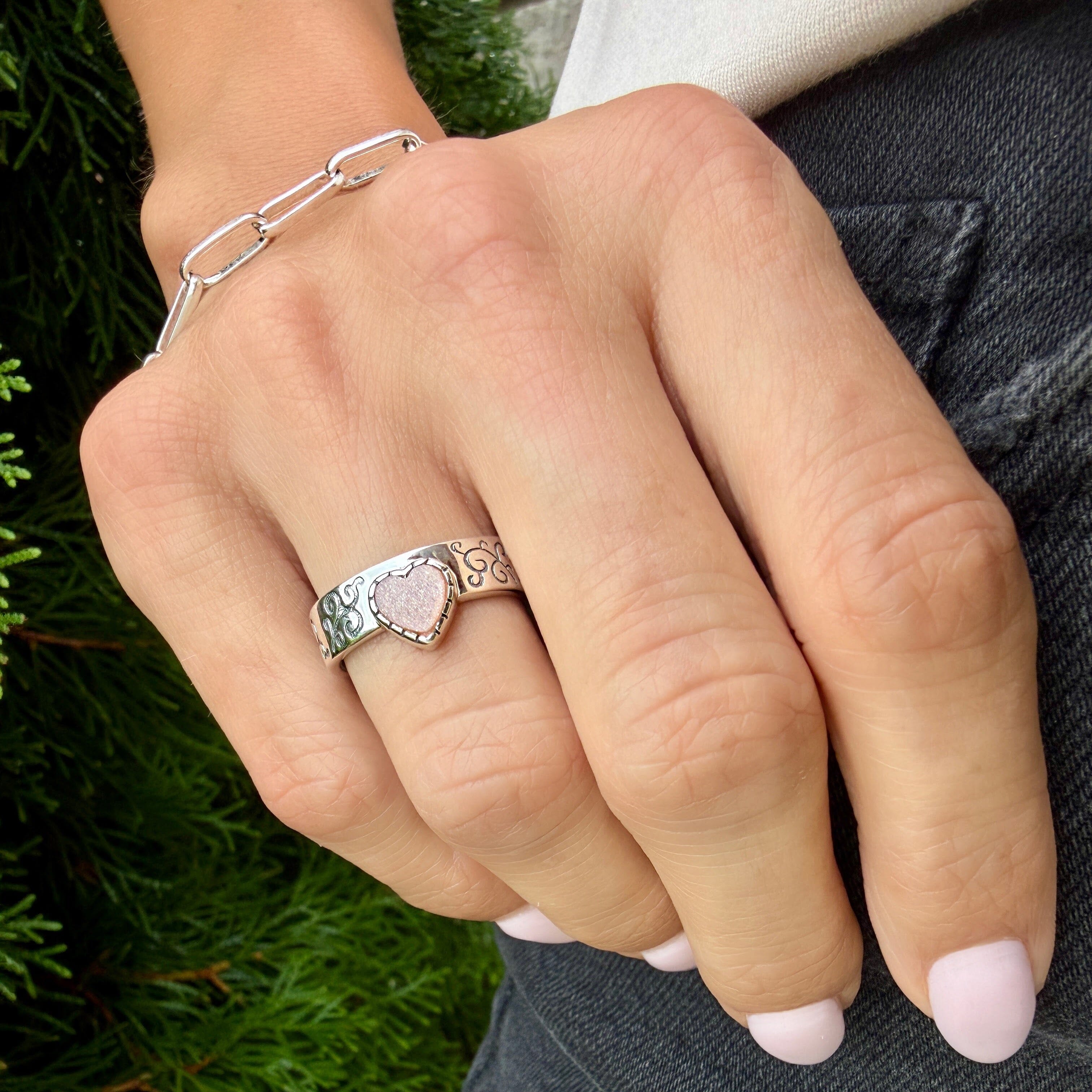 sterling silver heart ring featuring a peach moonstone center stone