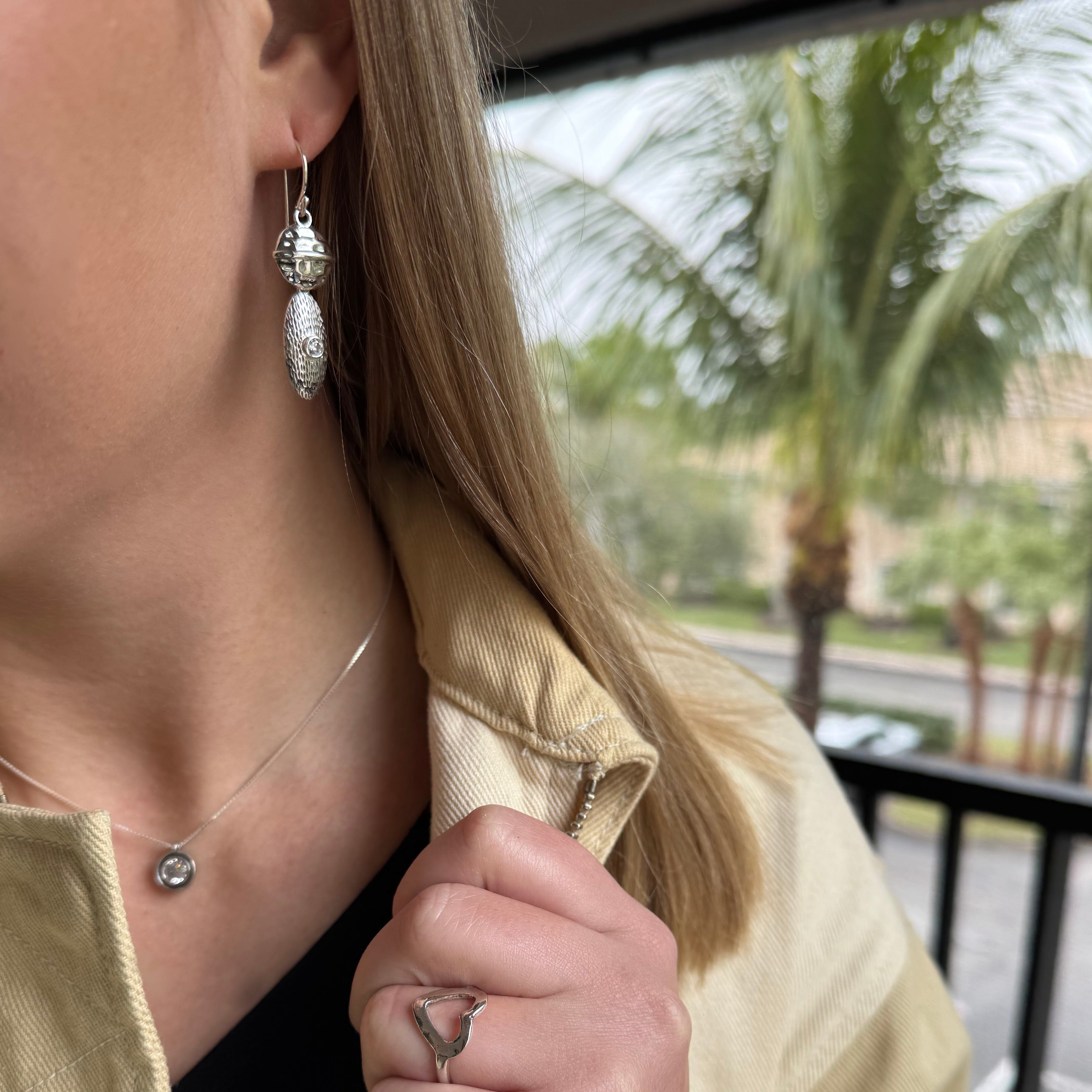 sterling silver earrings paired with the open heart ring