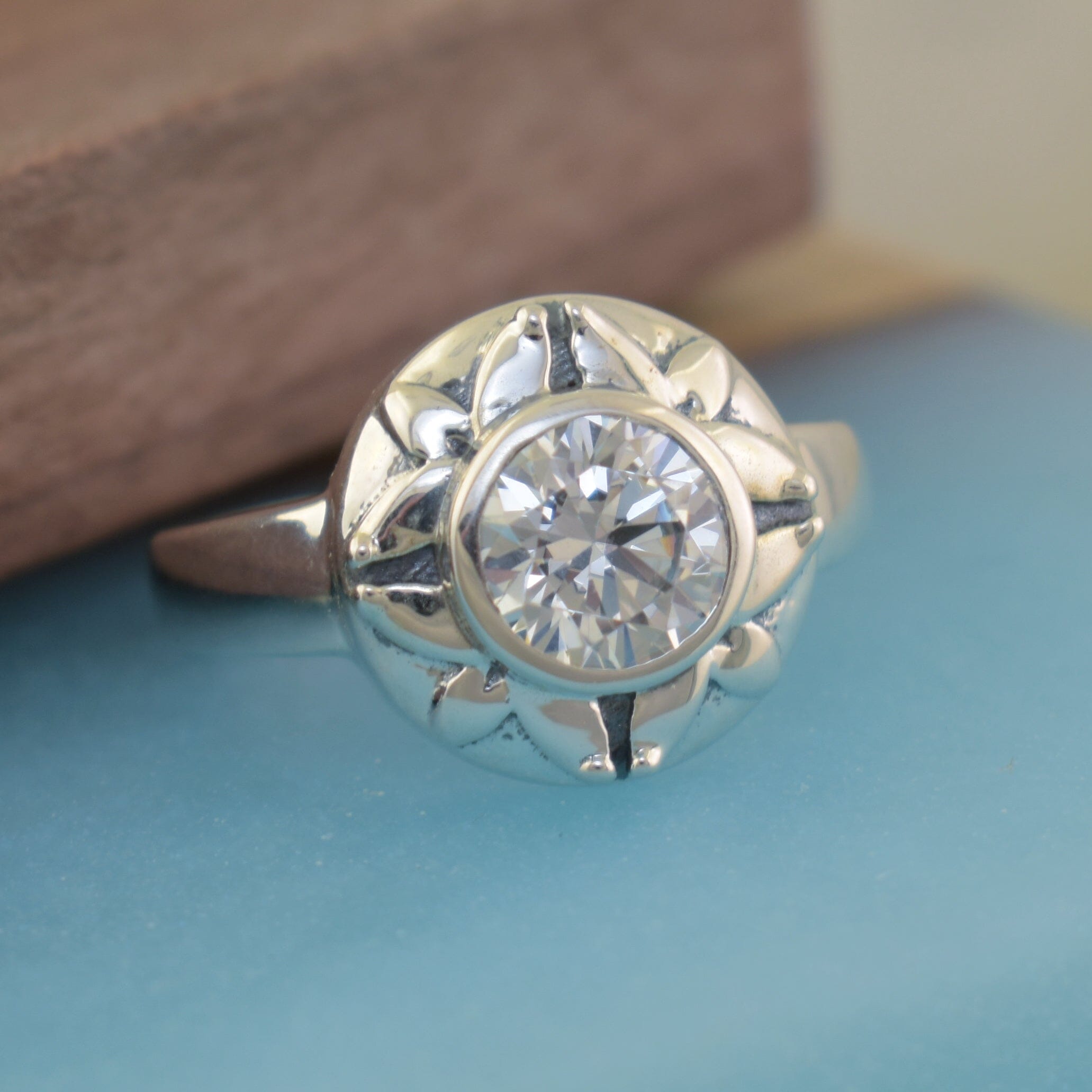 Designer-inspired sterling silver ring with round cubic zirconia center
