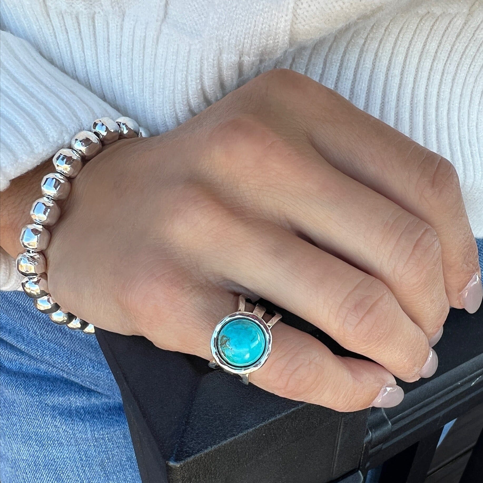 pinky ring with a triple silver band featuring turquoise