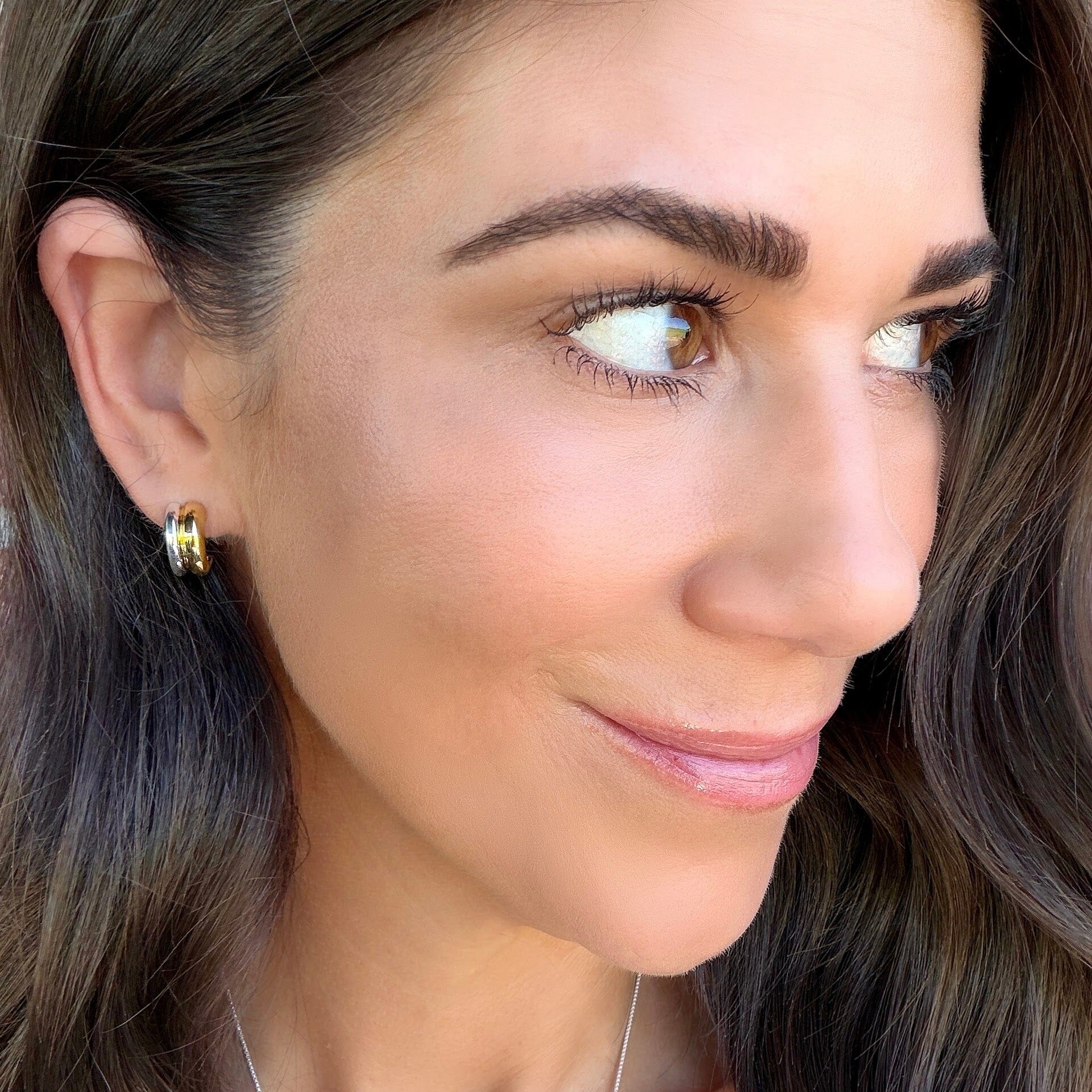 silver and gold huggie style hoops