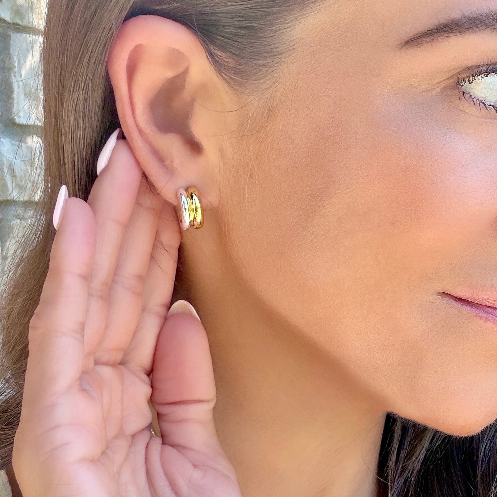 women's two-toned huggie earrings
