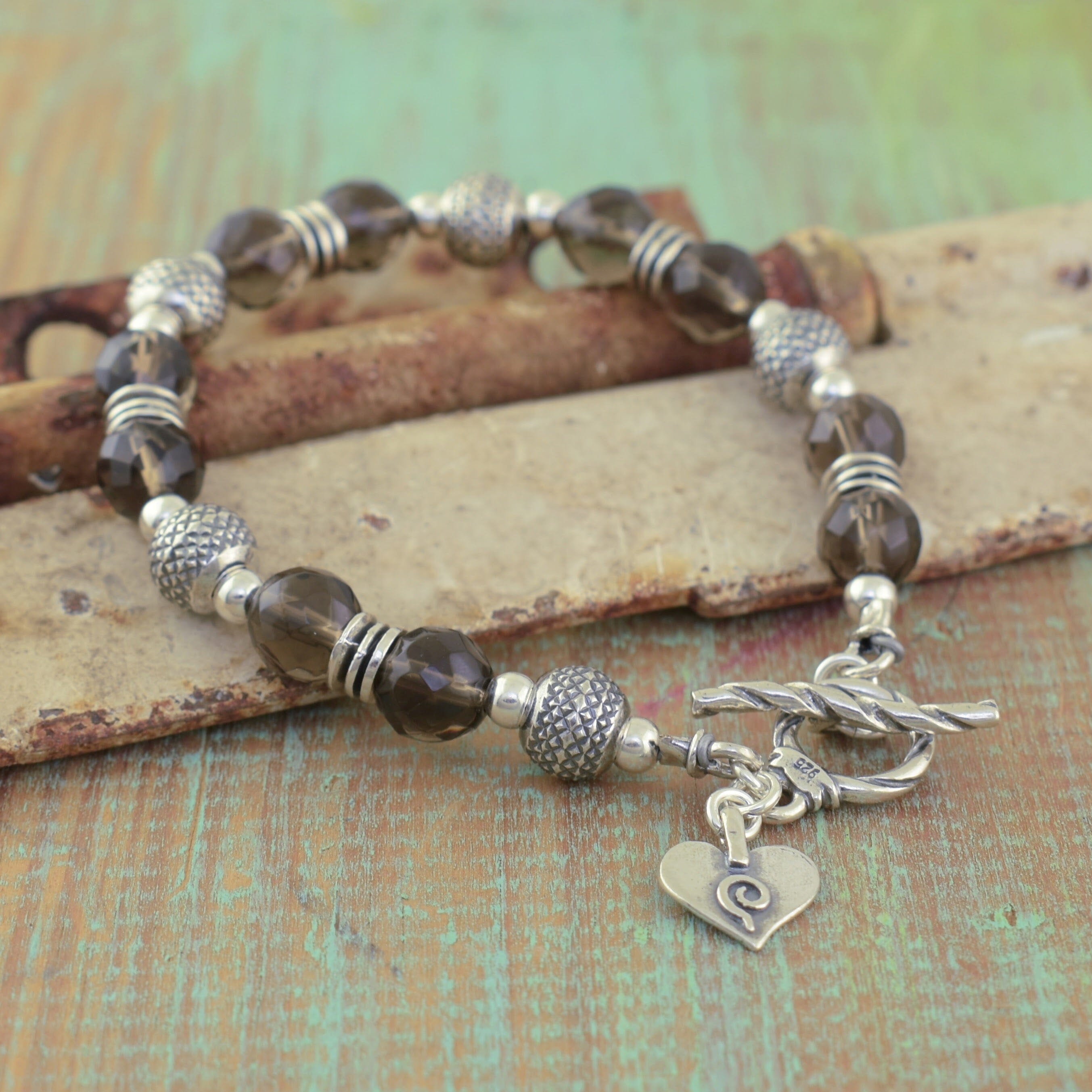 Sterling silver hand crafted bracelet with silver accents