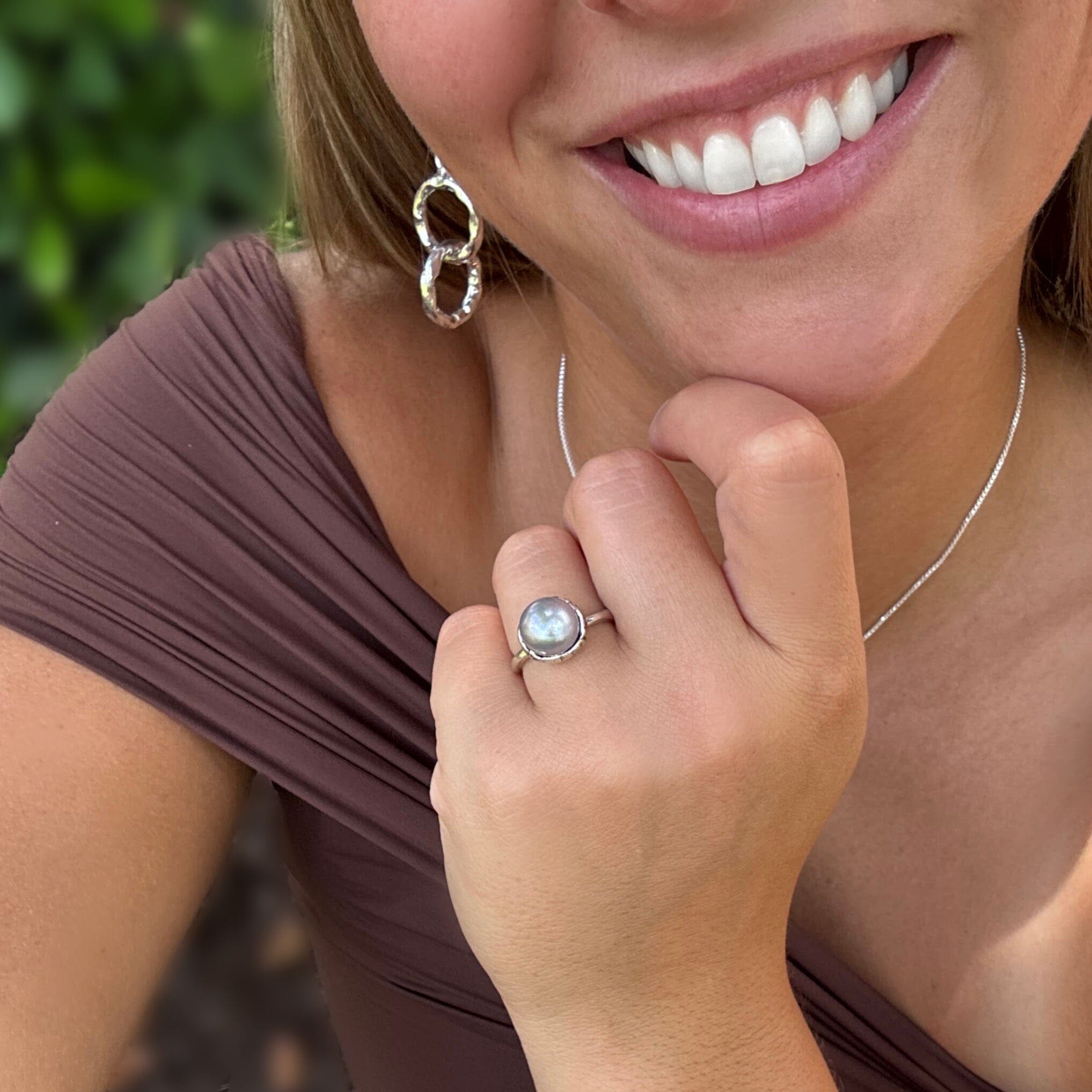 hand crafted sterling silver ring paired with todays girl earrings