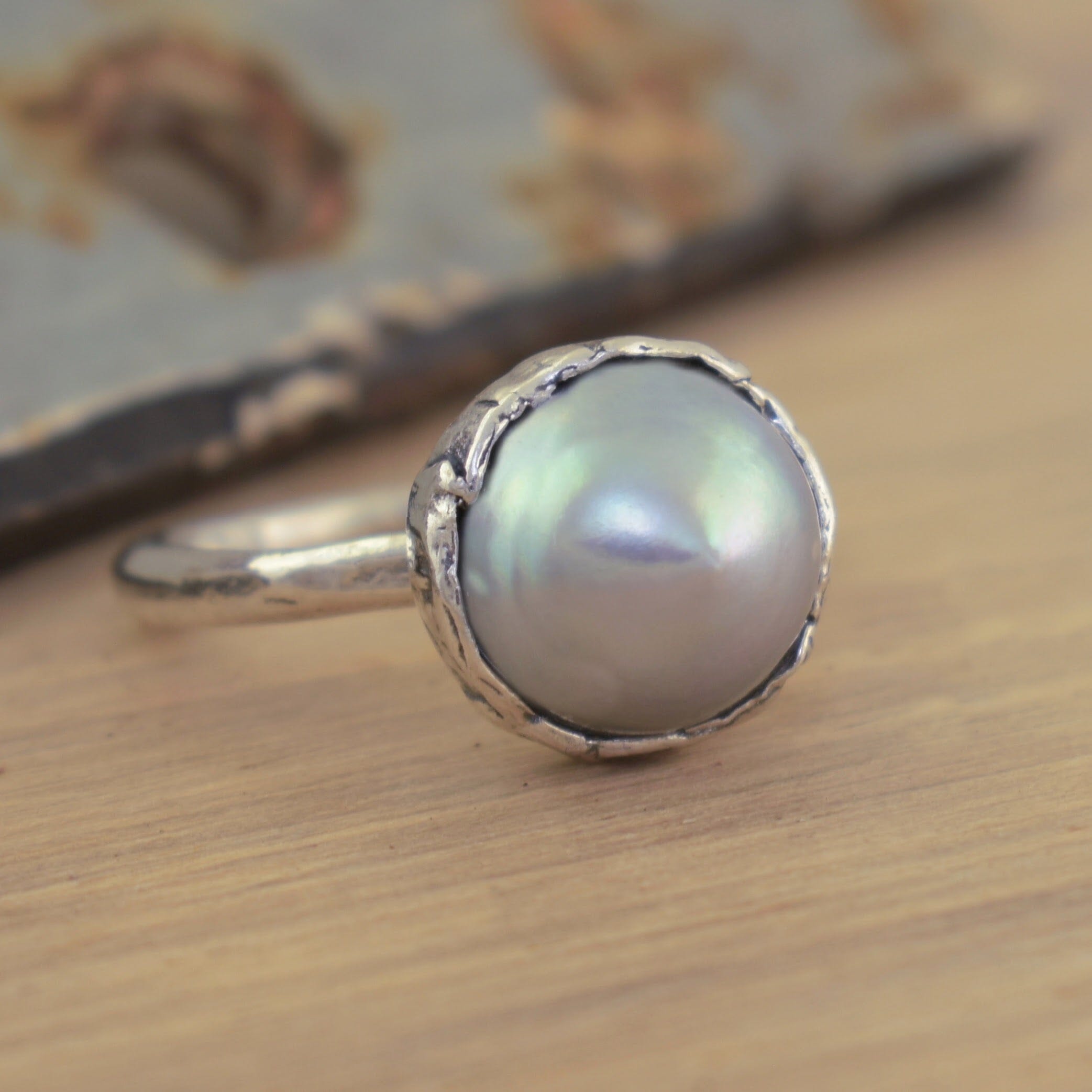 Sterling silver hand crafted ring with a grey pearl