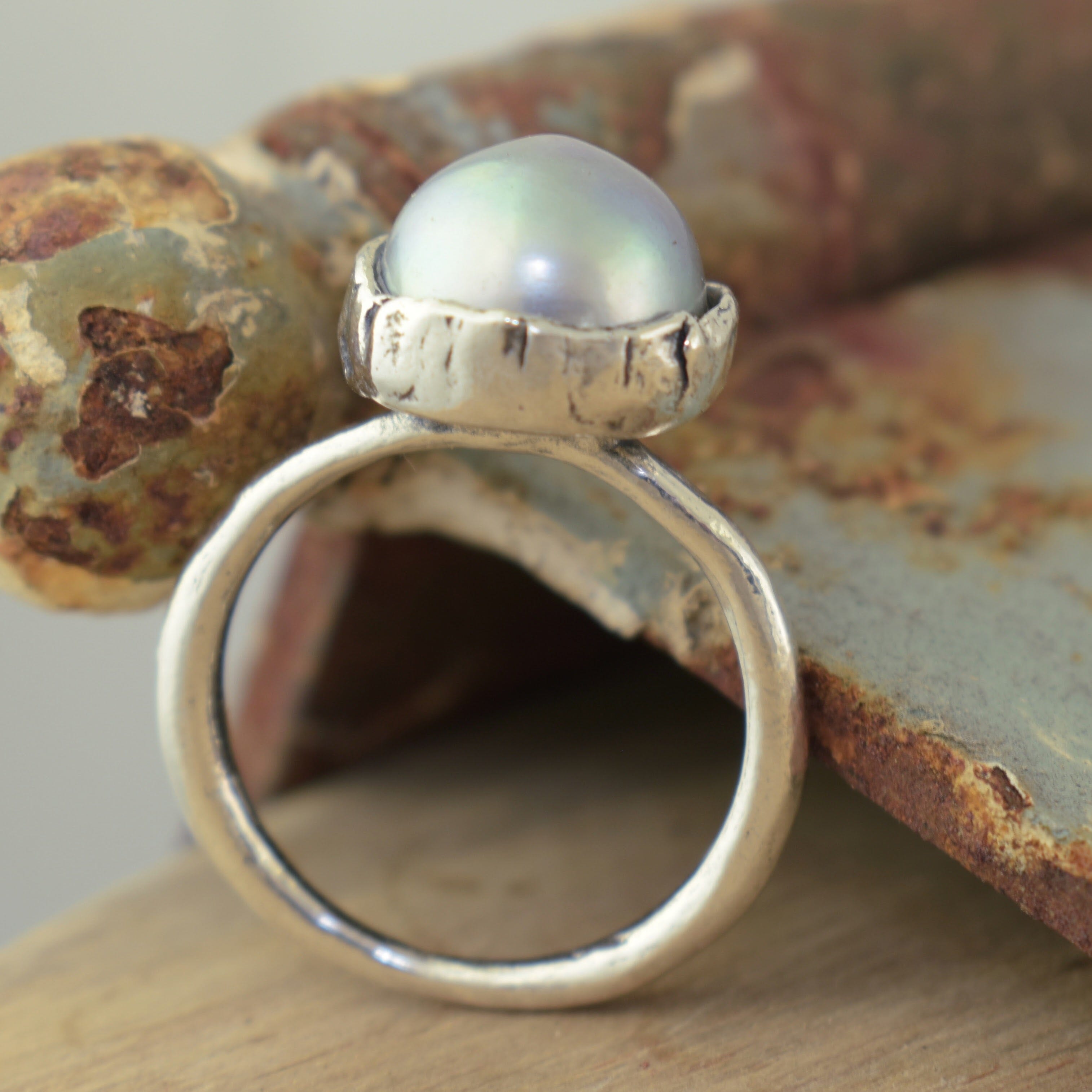 Moonlight shore ring with a bezel set freshwater pearl