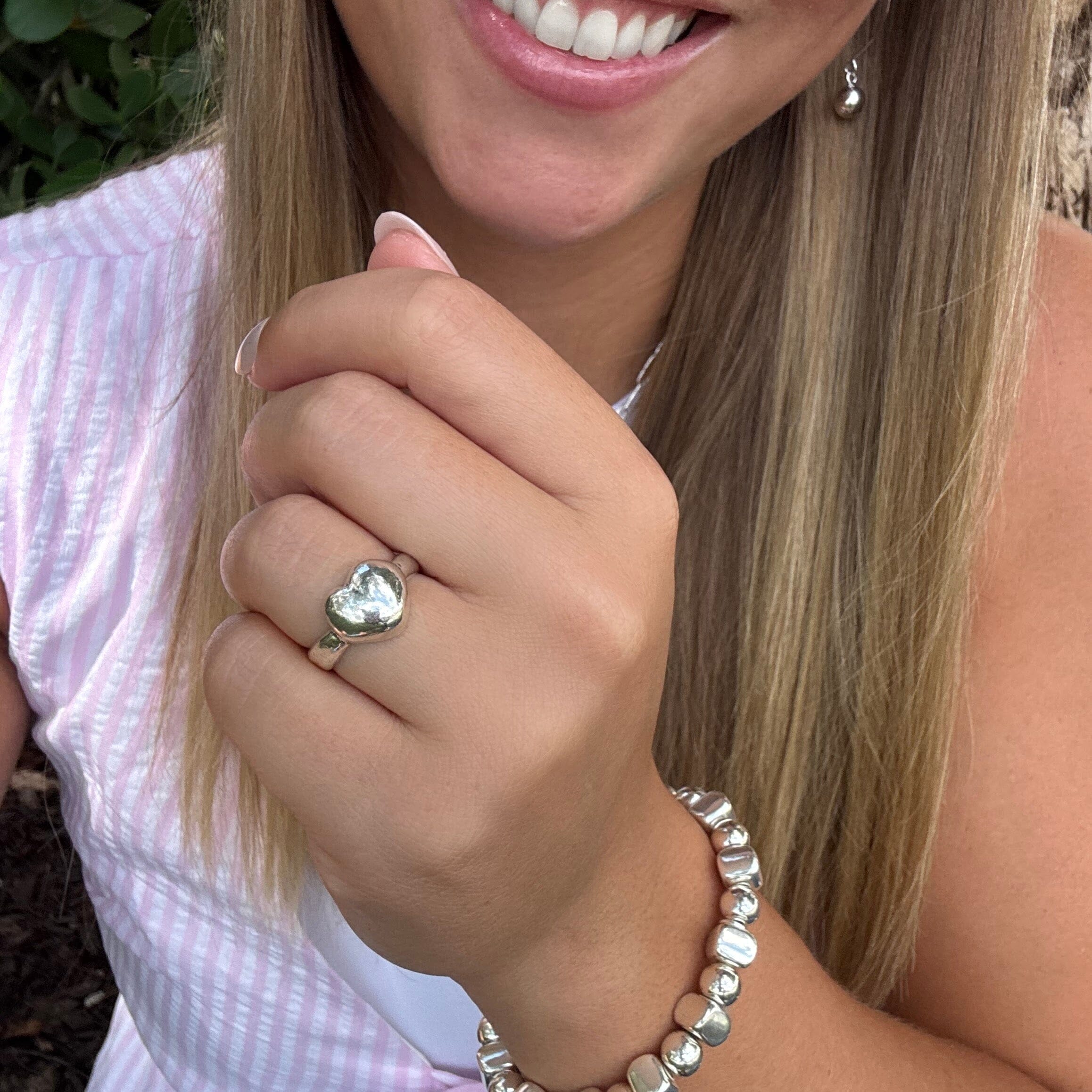 My Heartthrob Ring paired with Roundabout Earrings and matching Bracelet