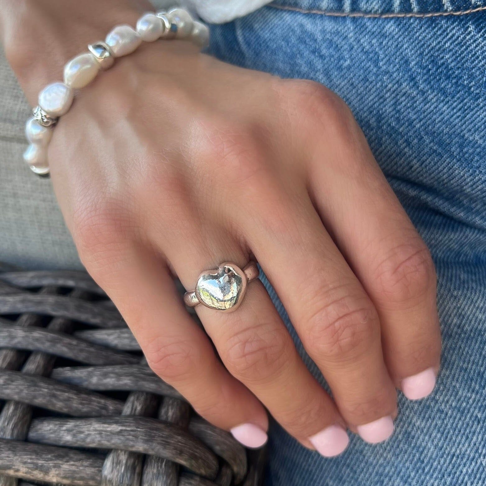 puffy heart ring in .925 sterling silver with an organic hammered finish