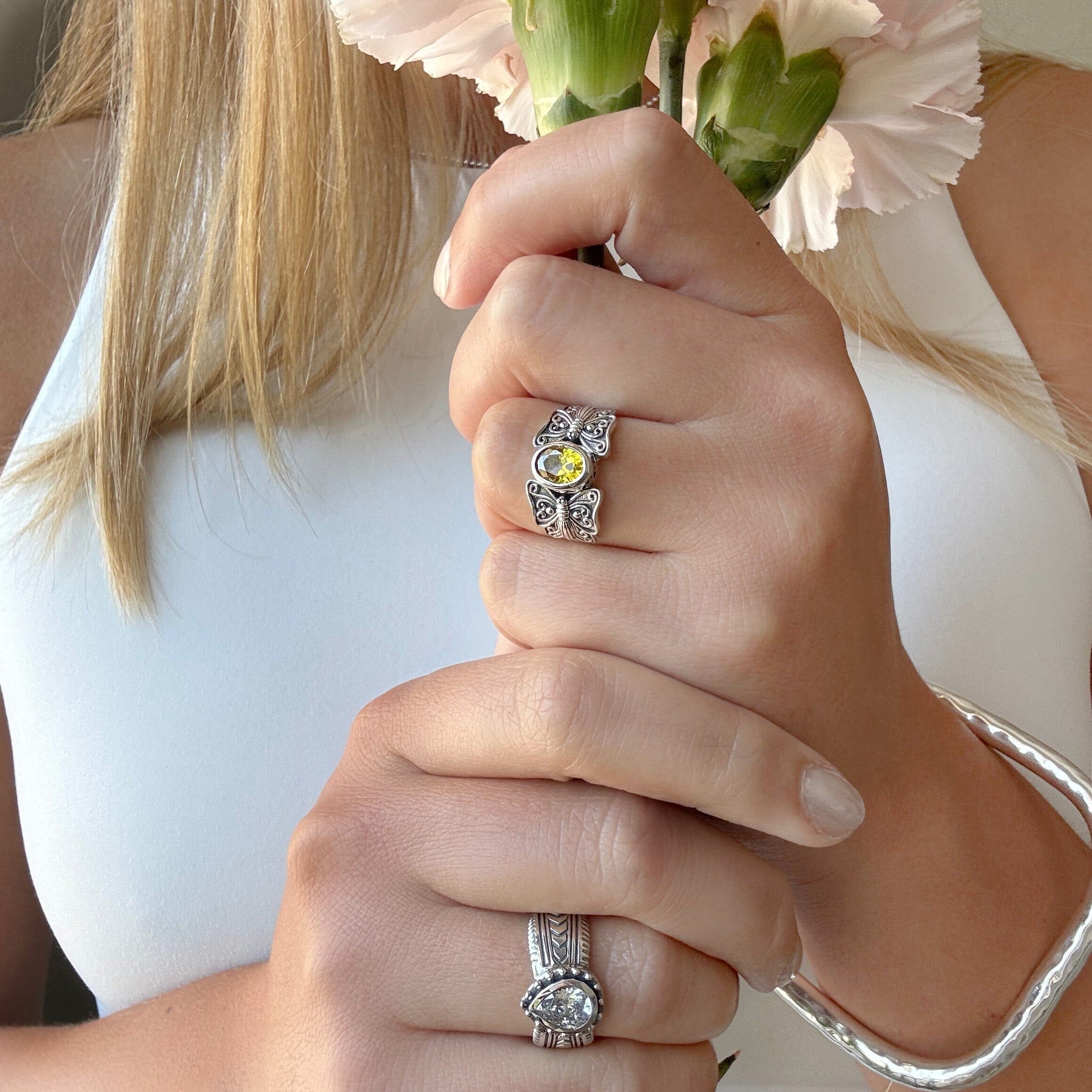New Beginnings citrine ring paired with On The Go clear cz ring