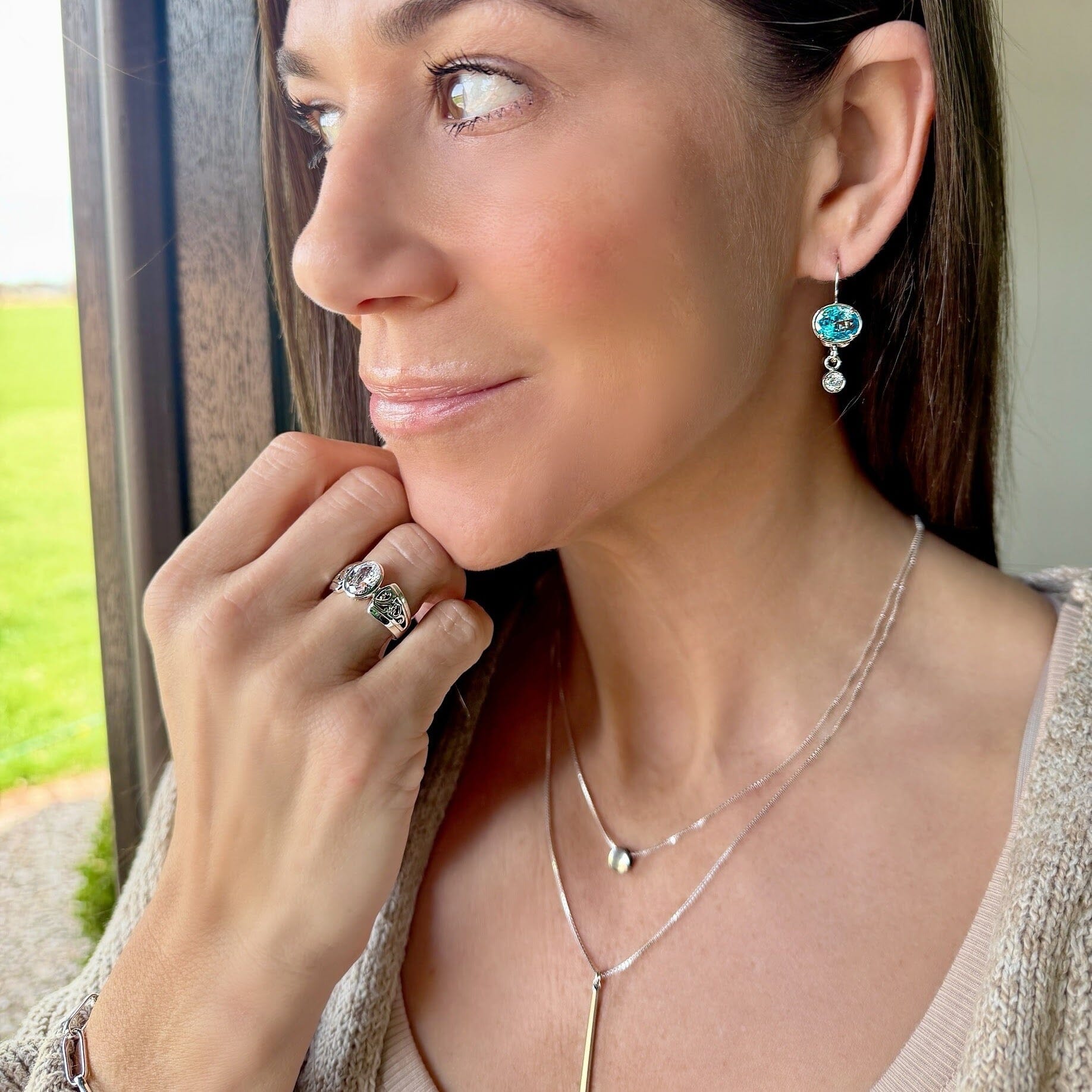 Ocean Club Earrings paired with sterling silver jewelry