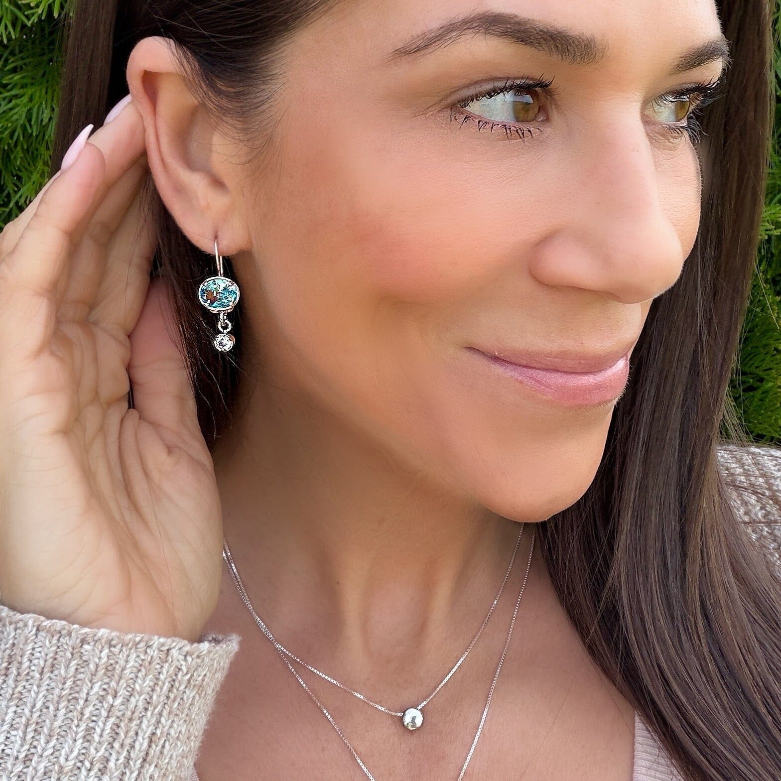 blue oval earrings with a round clear cz dangle