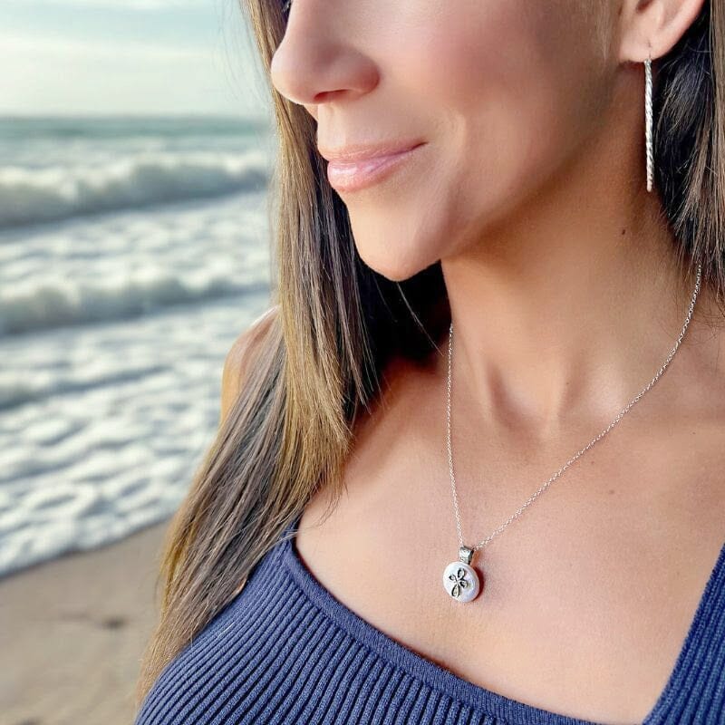 Handcrafted sterling silver necklace with a pearl pendant