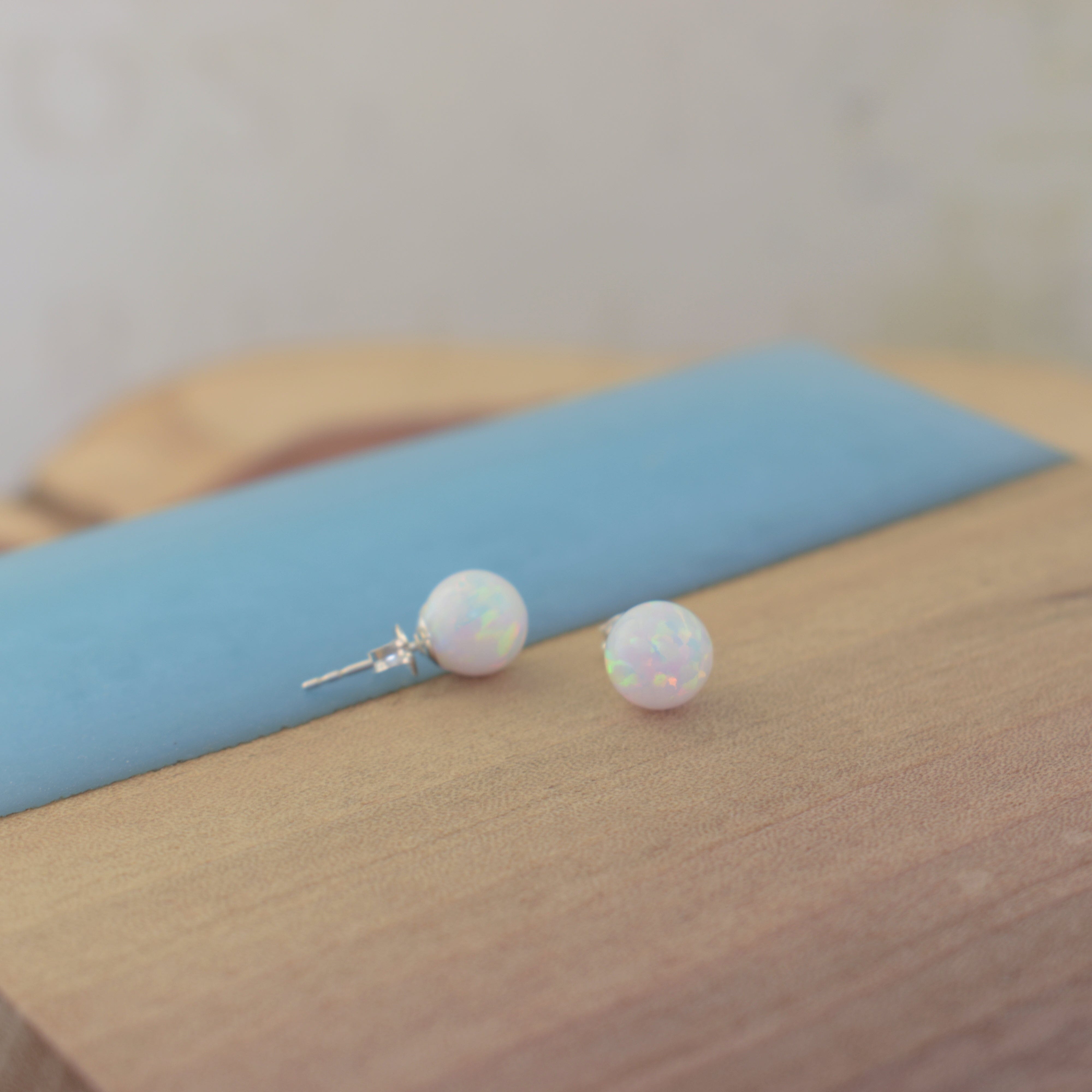 Opal stud earrings with sterling silver posts