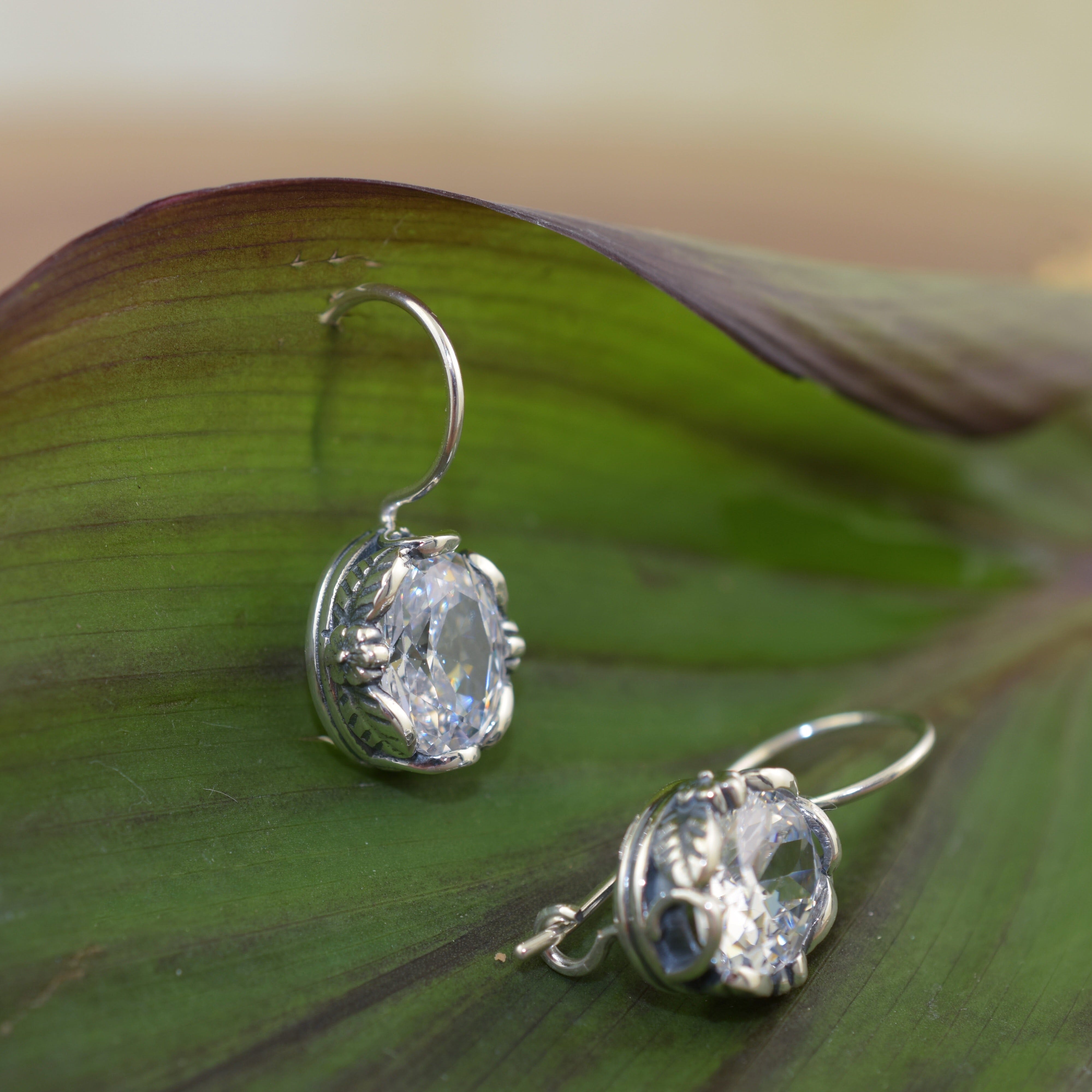 Sterling silver secured french back earrings