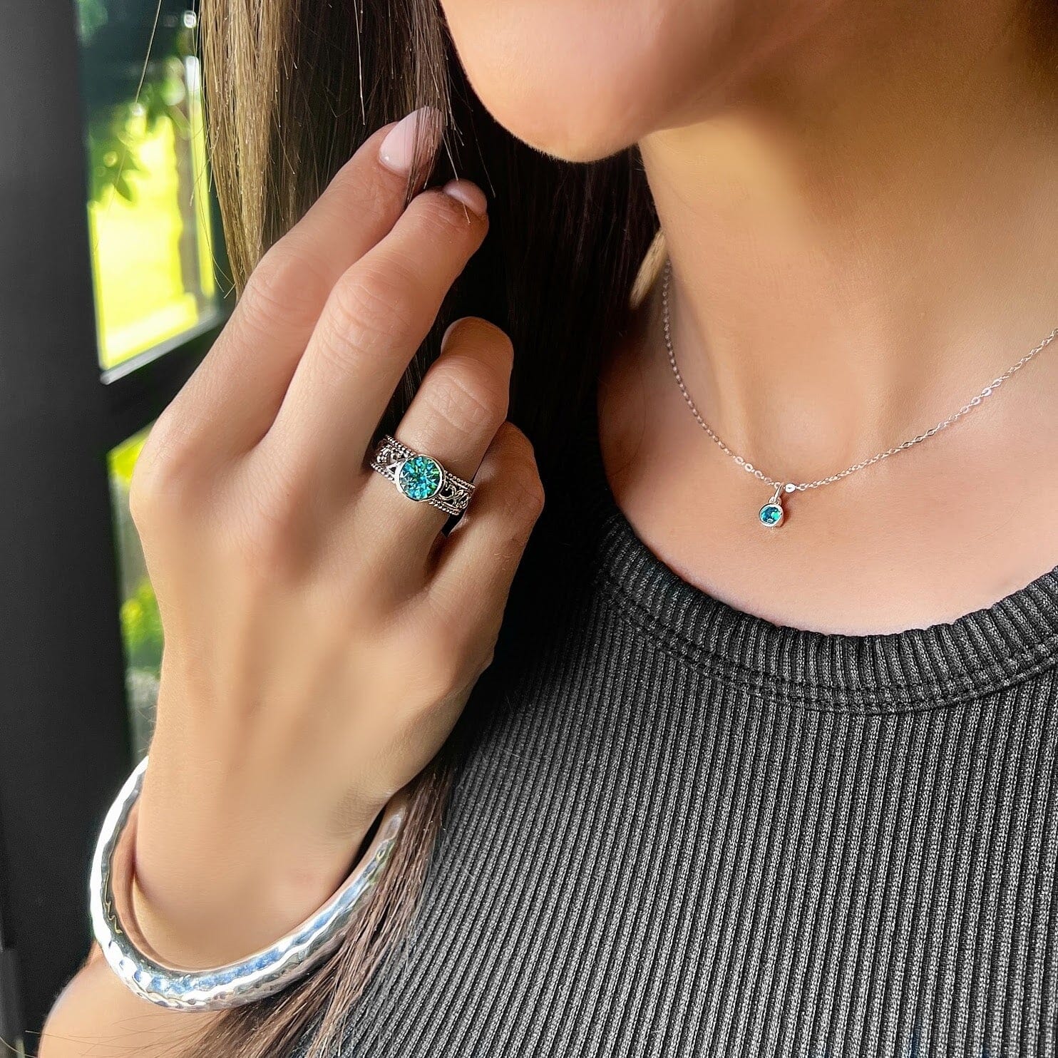 Sterling silver .925 ring with a round set stone paired with the birthday girl necklace and the sonoma bangle