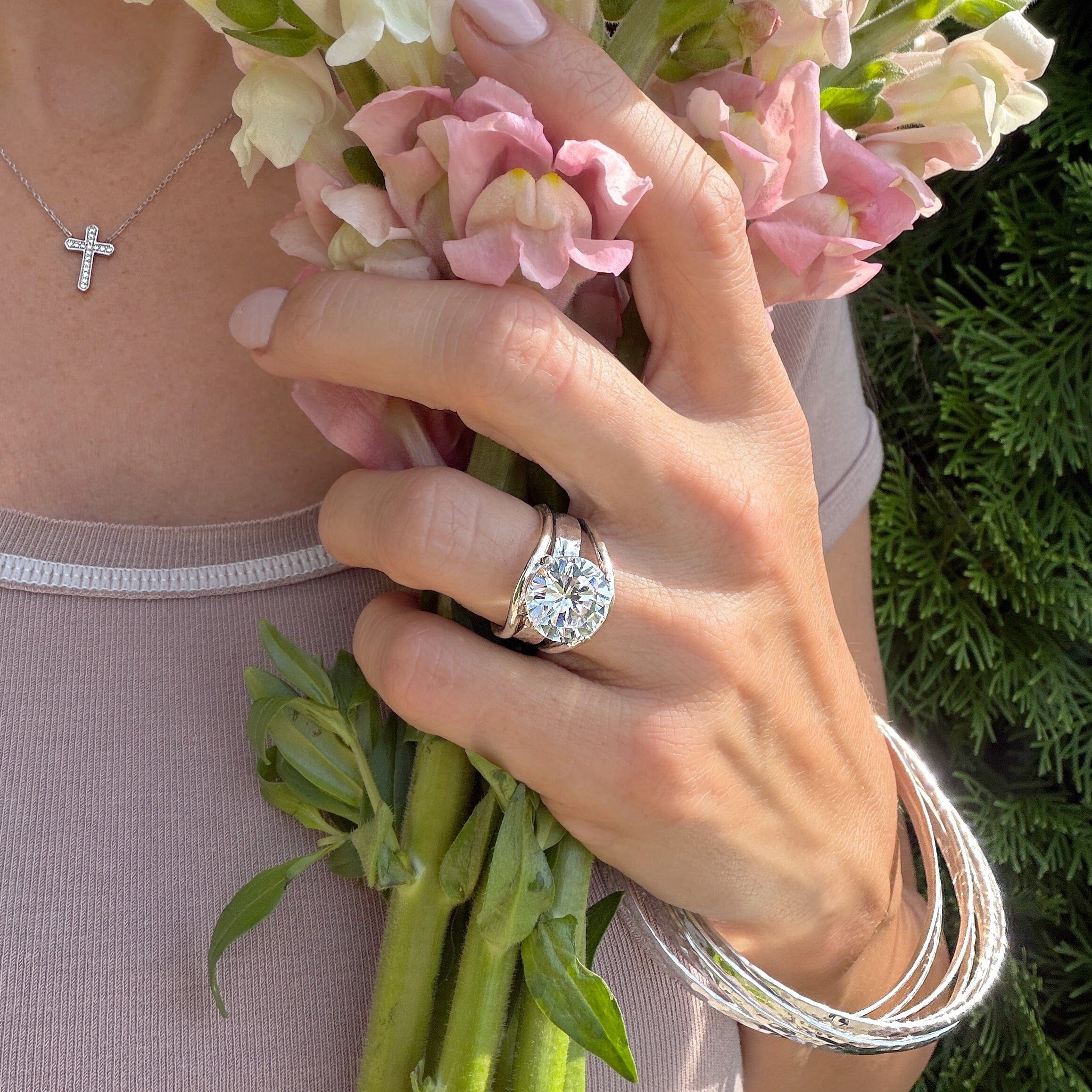 cubic zirconia prong-set in a handcrafted .925 sterling silver ring