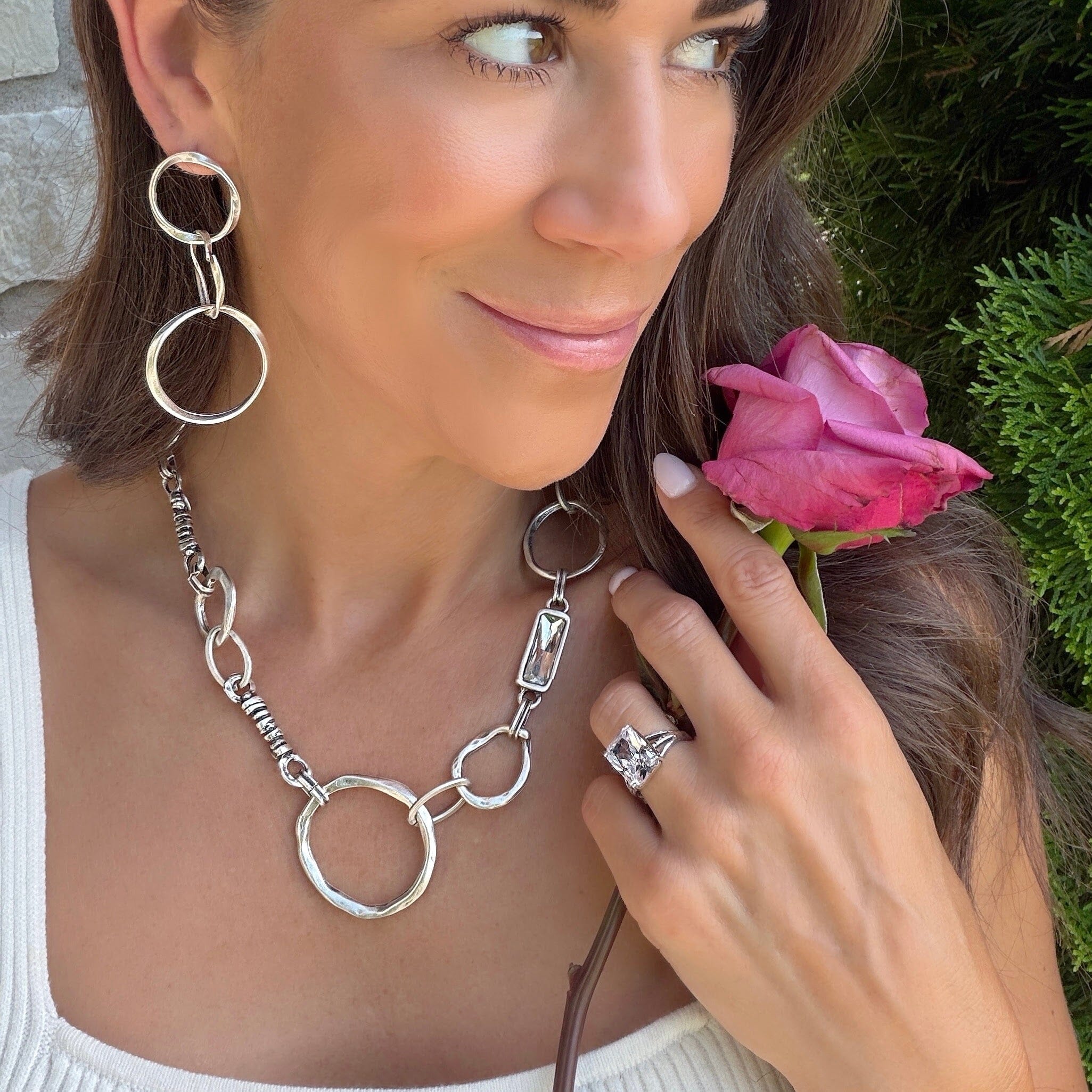 organic link necklace featuring a clear crystal stone