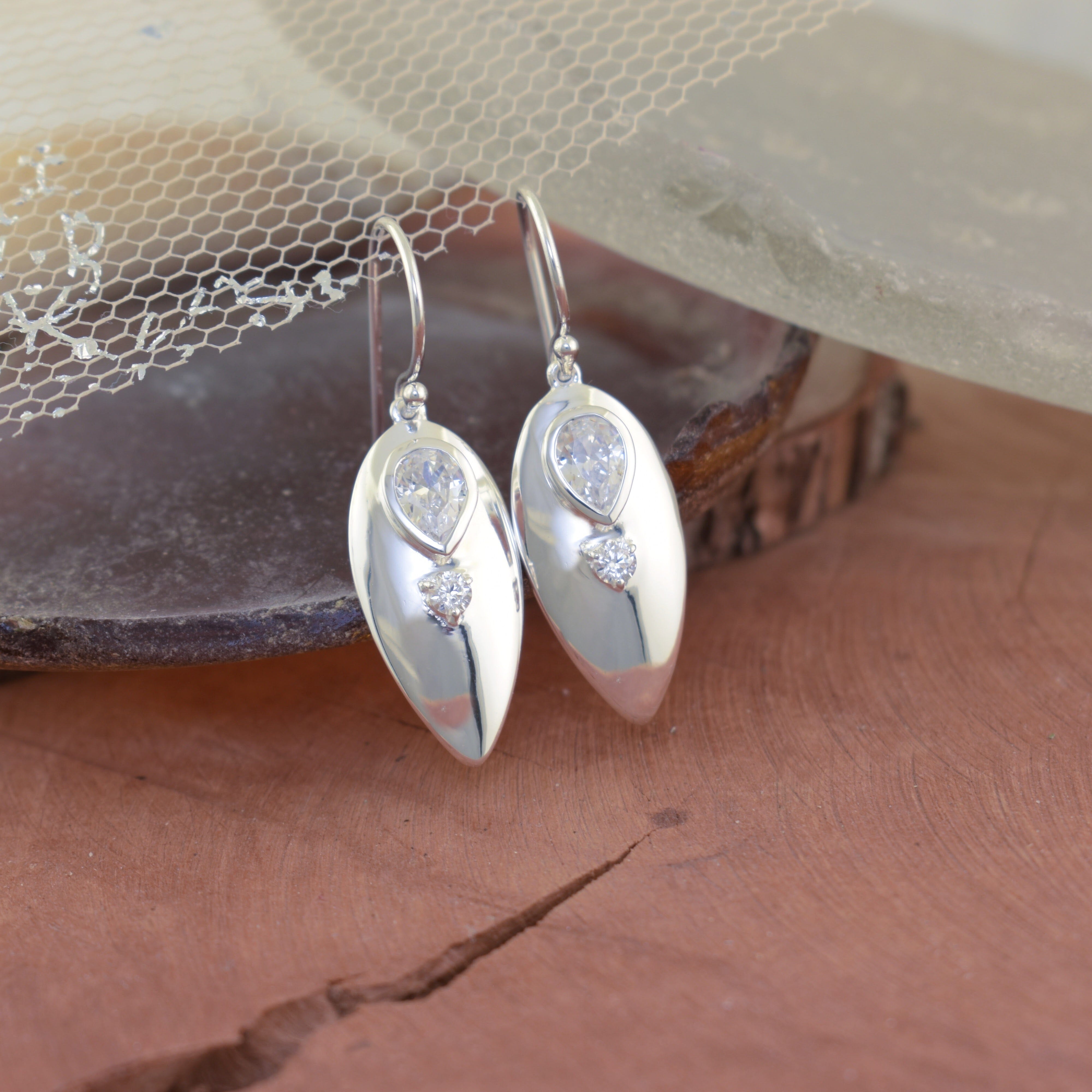 High polished sterling silver dangle earrings