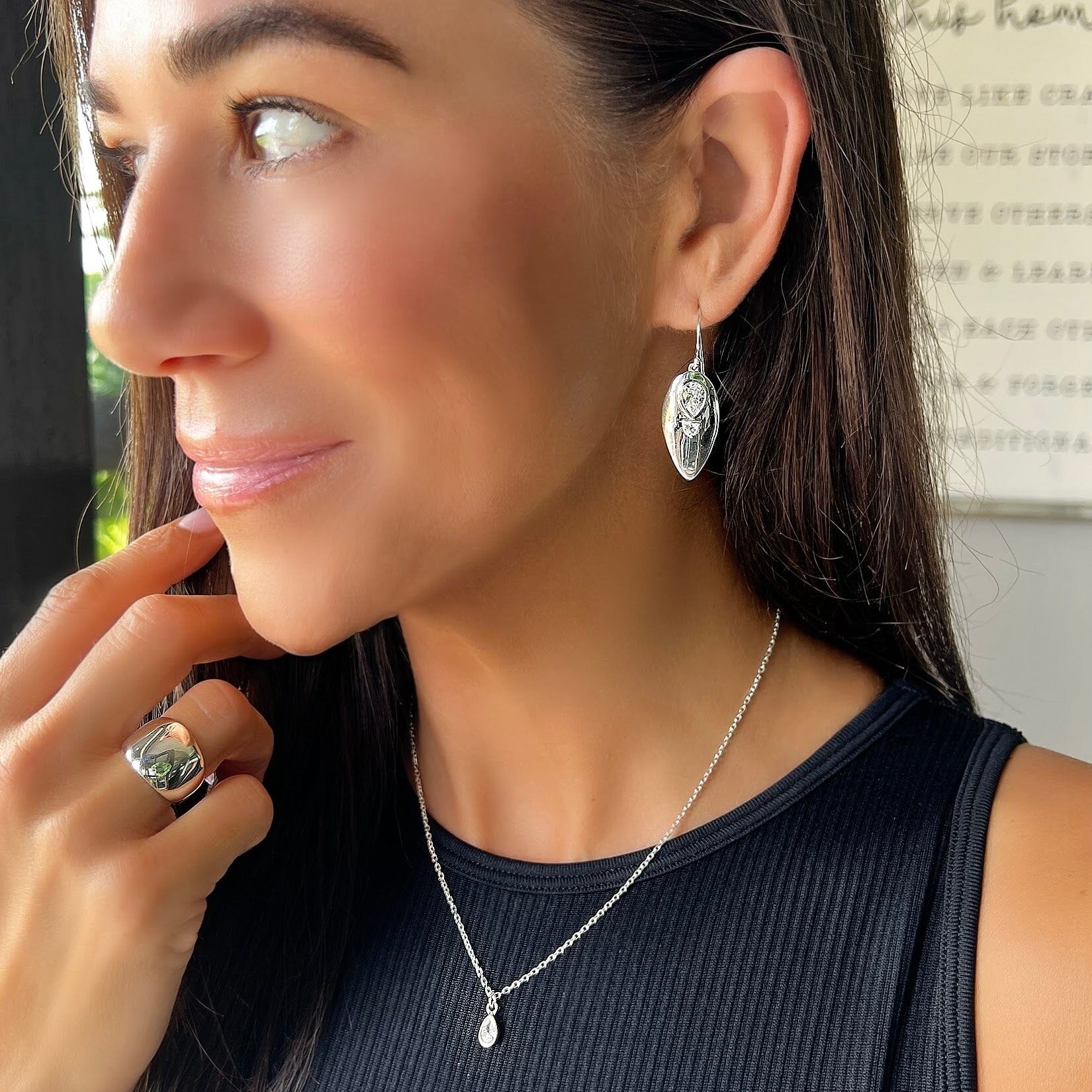Party- on earrings paired with beautifully broken necklace and classic dome ring