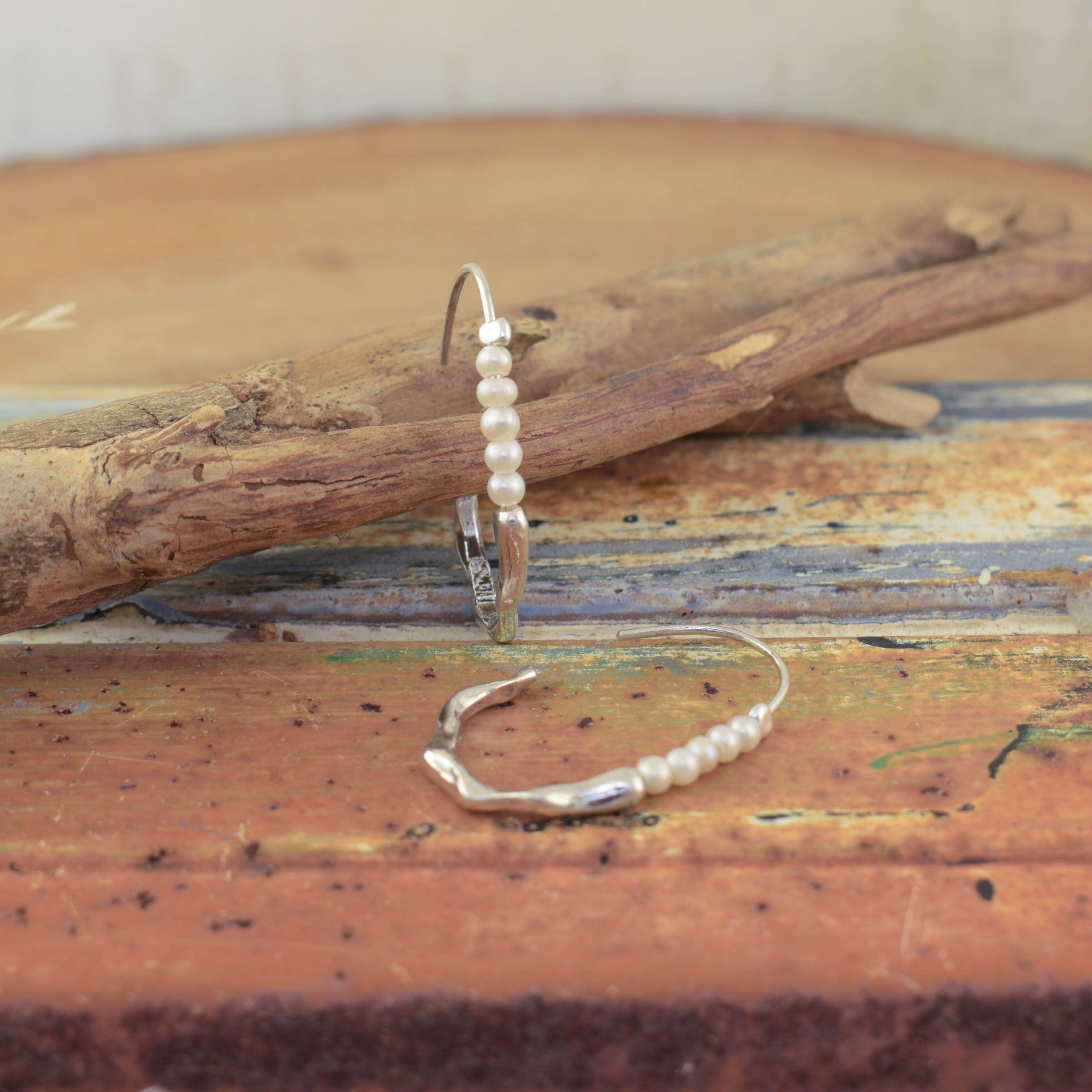 open hoop earrings called Pearlie Pop earrings