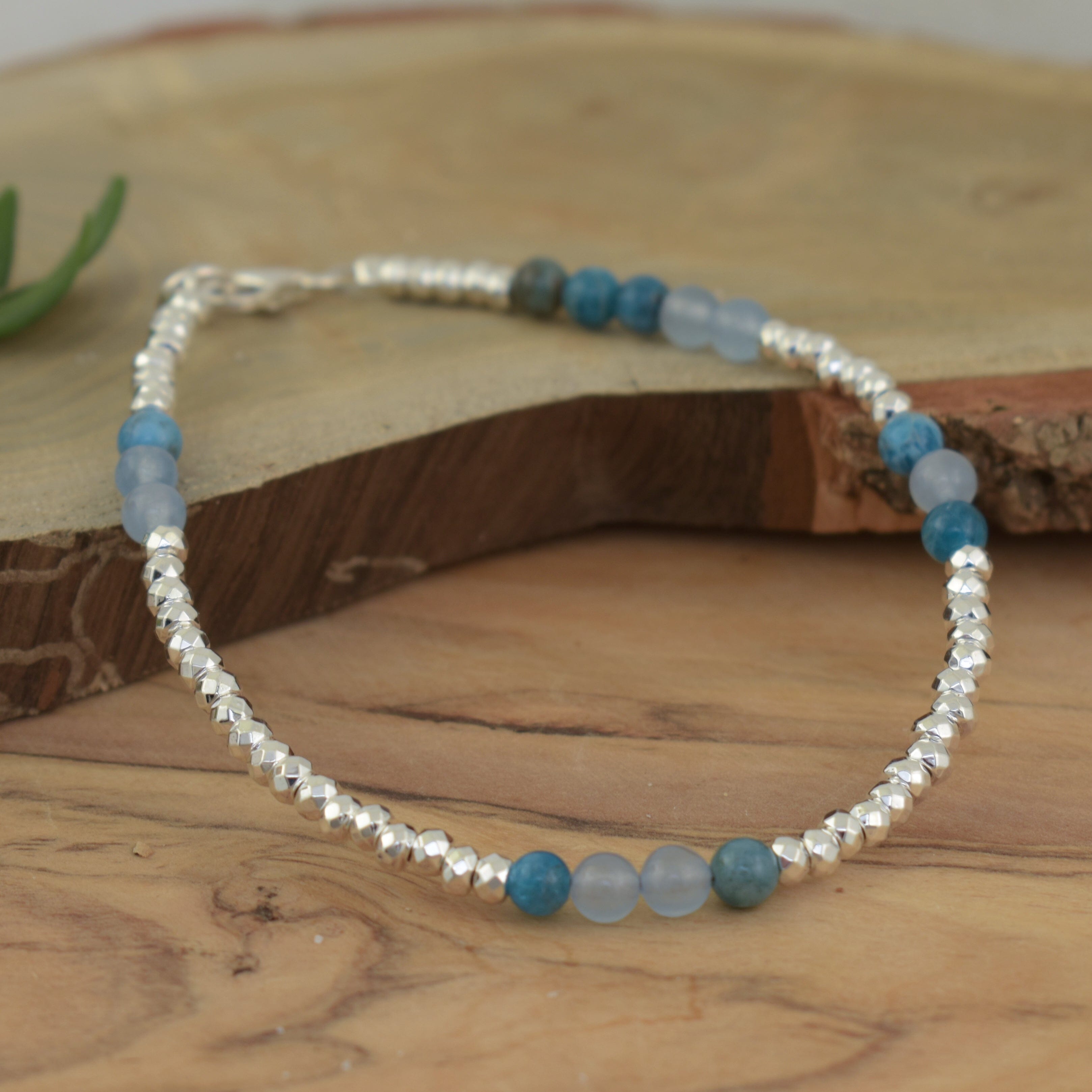 dainty wire bracelet featuring genuine apatite and hematite, and sterling silver crinkle beads