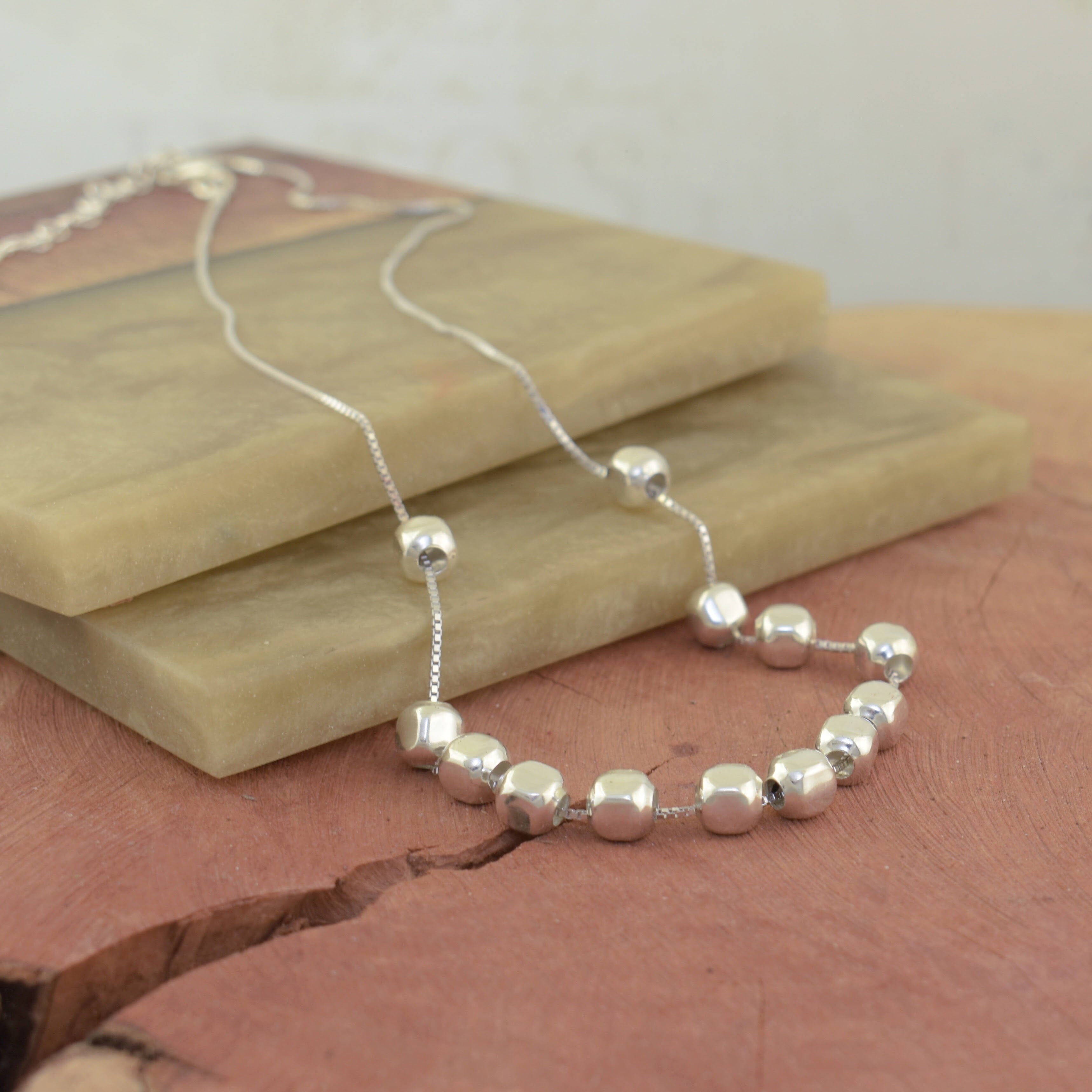 Bead necklace called Pebble parade 